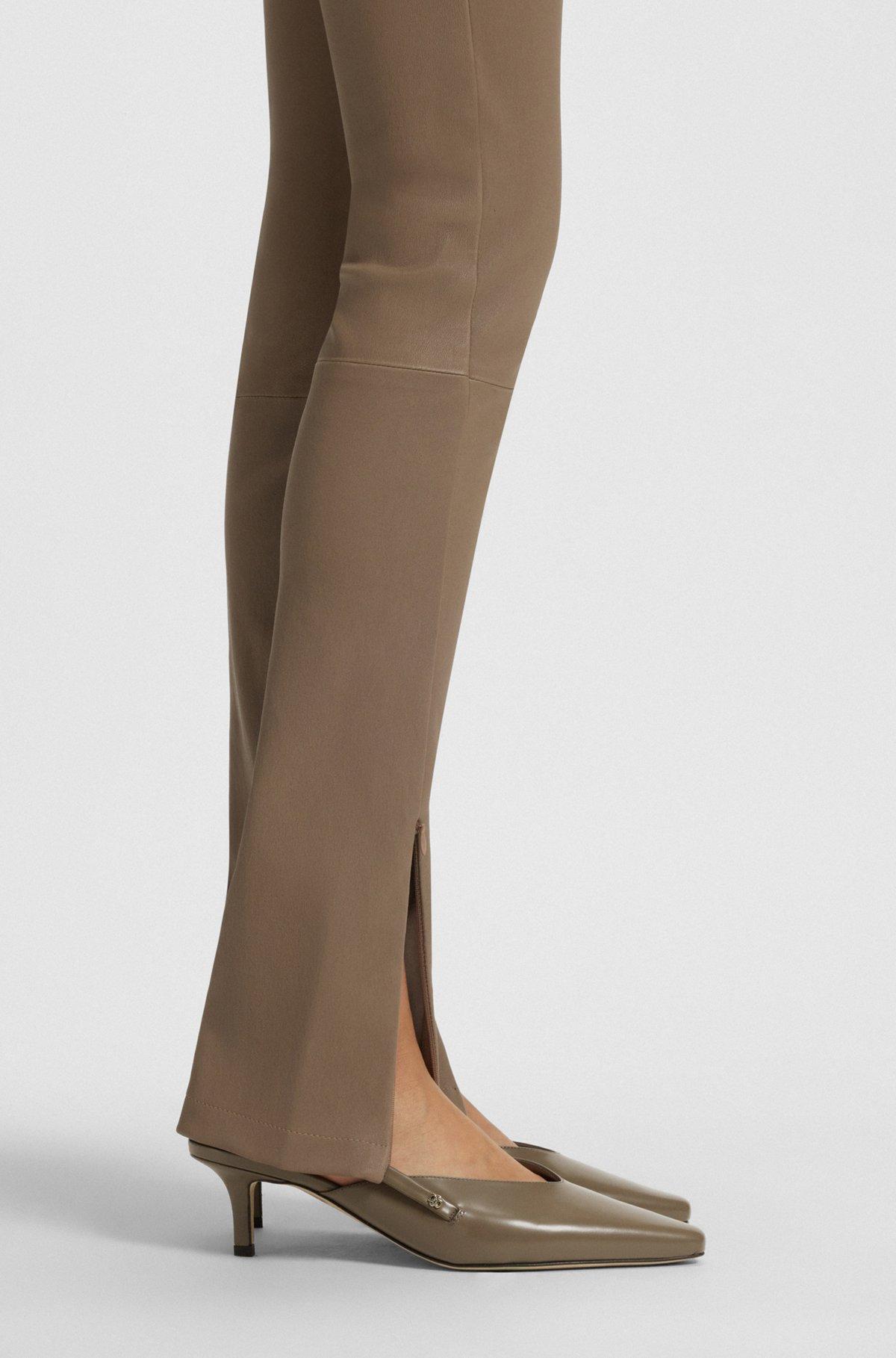 Slingback pumps in polished leather Product Image