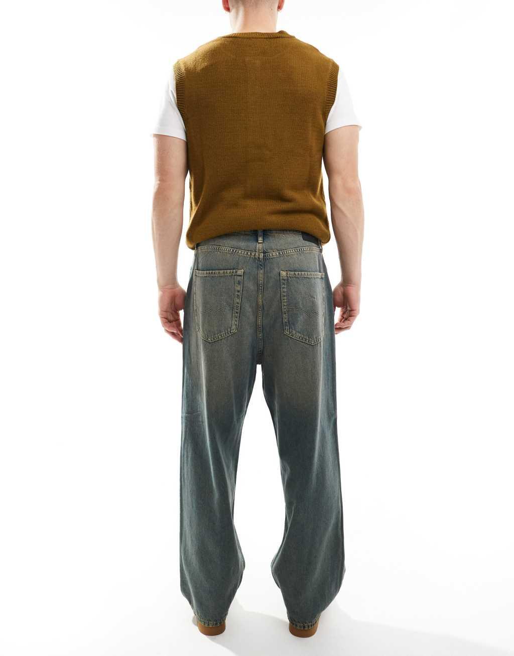 Jack & Jones ron skater jeans with brown cast wash in black Product Image