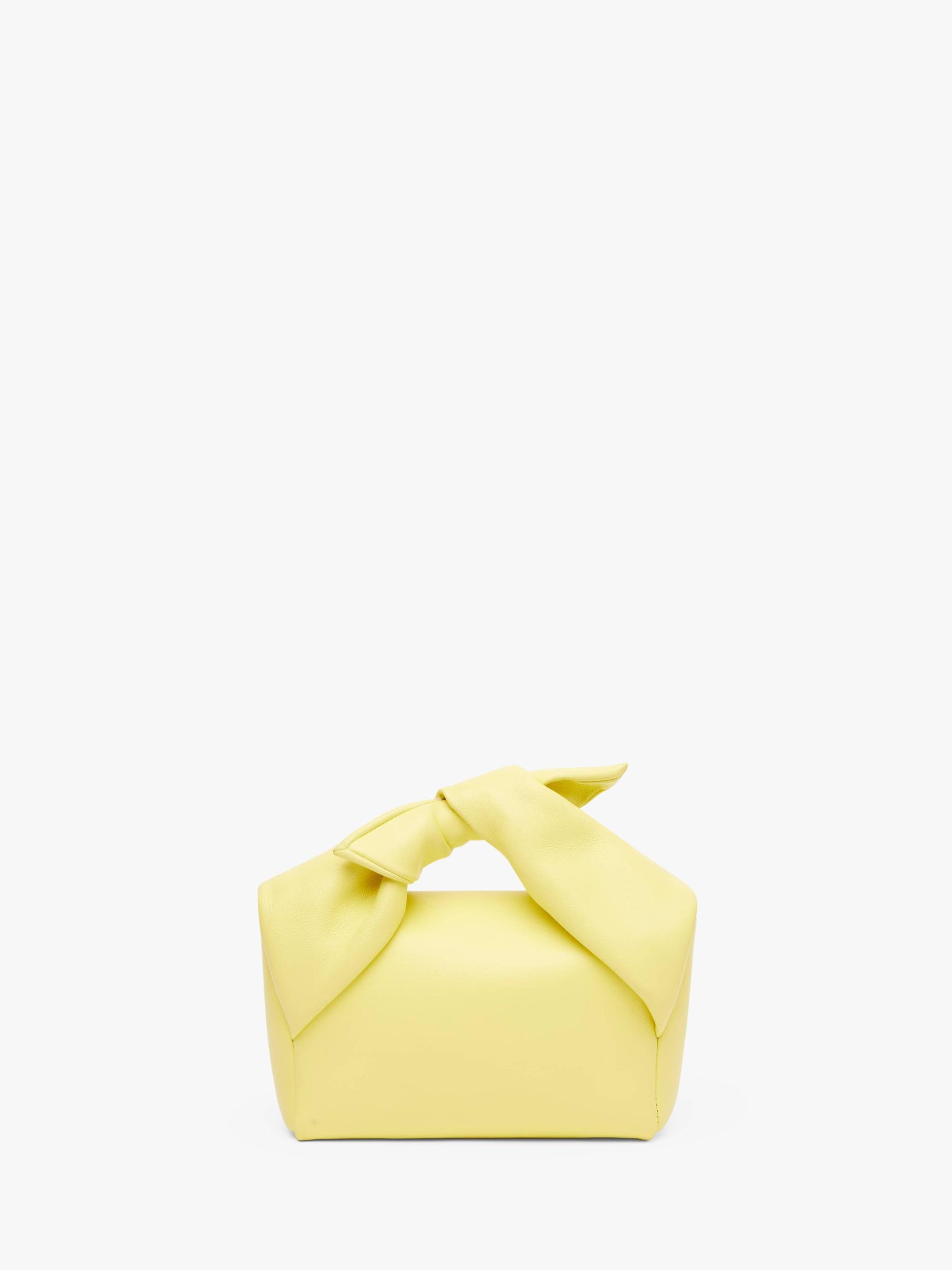 MEDIUM BOW TWISTER - LEATHER TOP HANDLE BAG Product Image