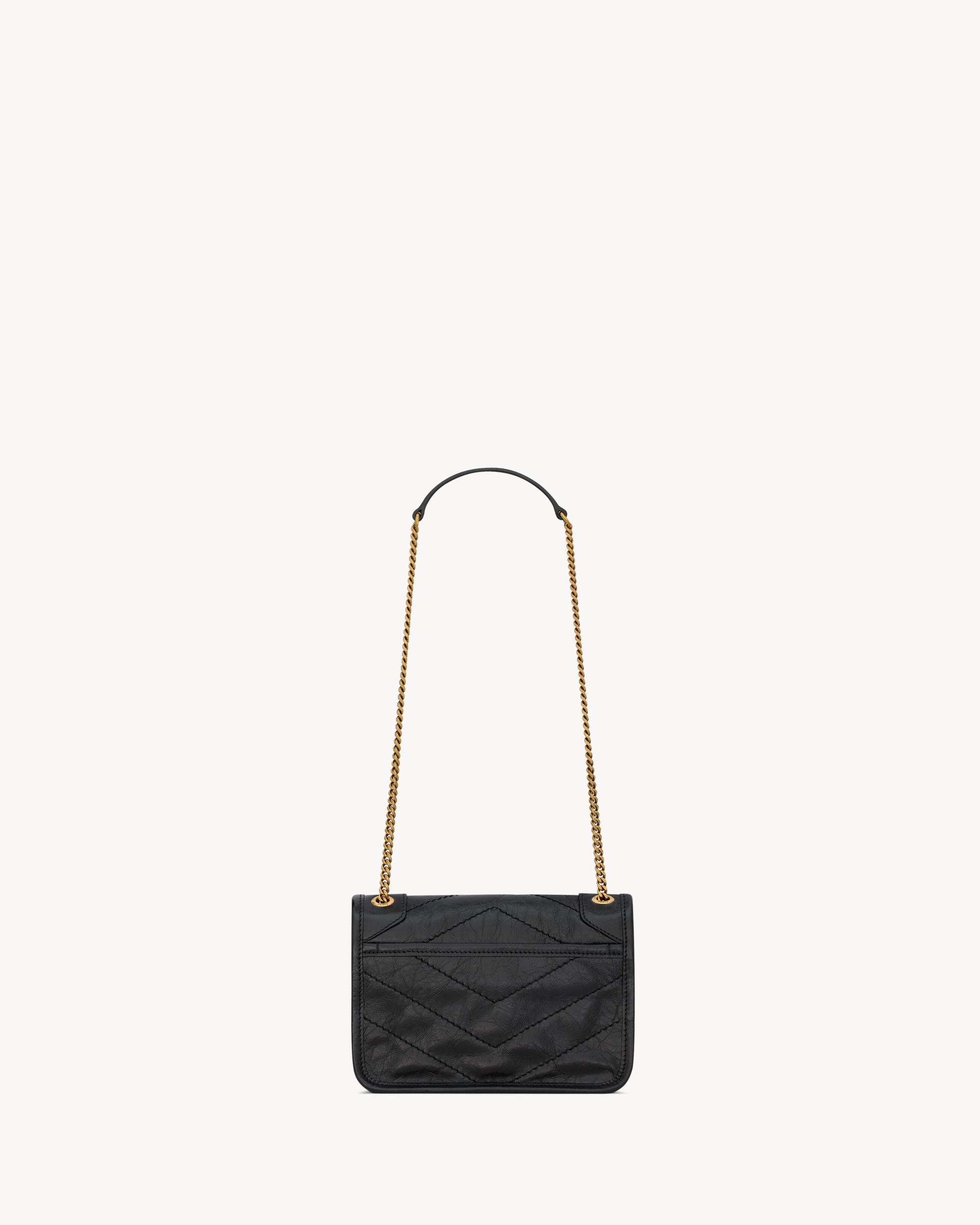 NIKI mini in canvas and leather Product Image