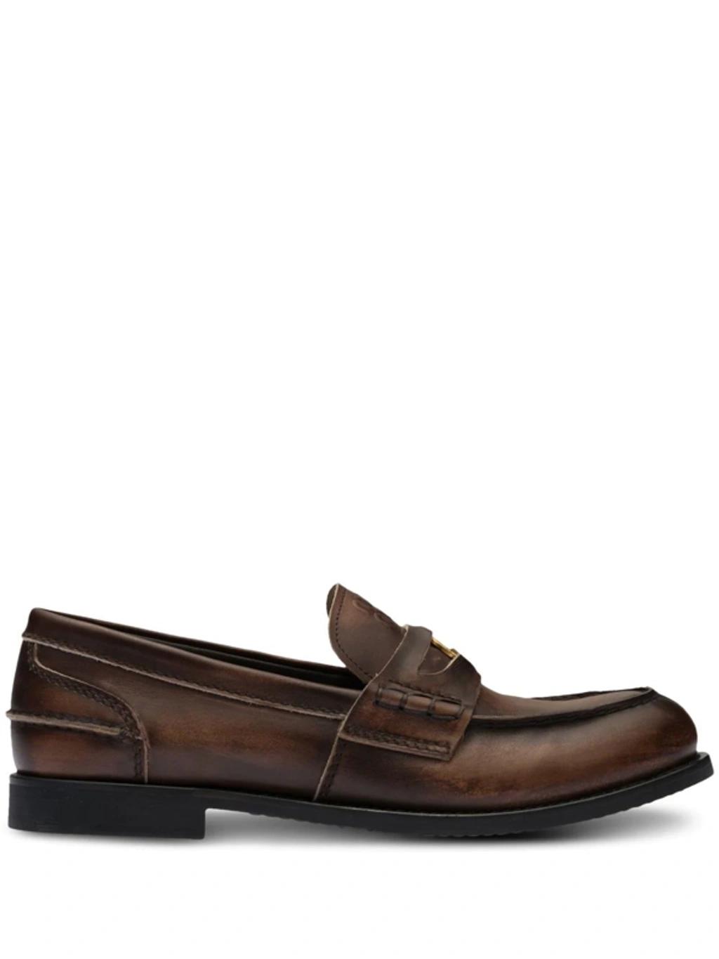 MIU MIU Leather Distressed Penny Loafers In Brown Product Image