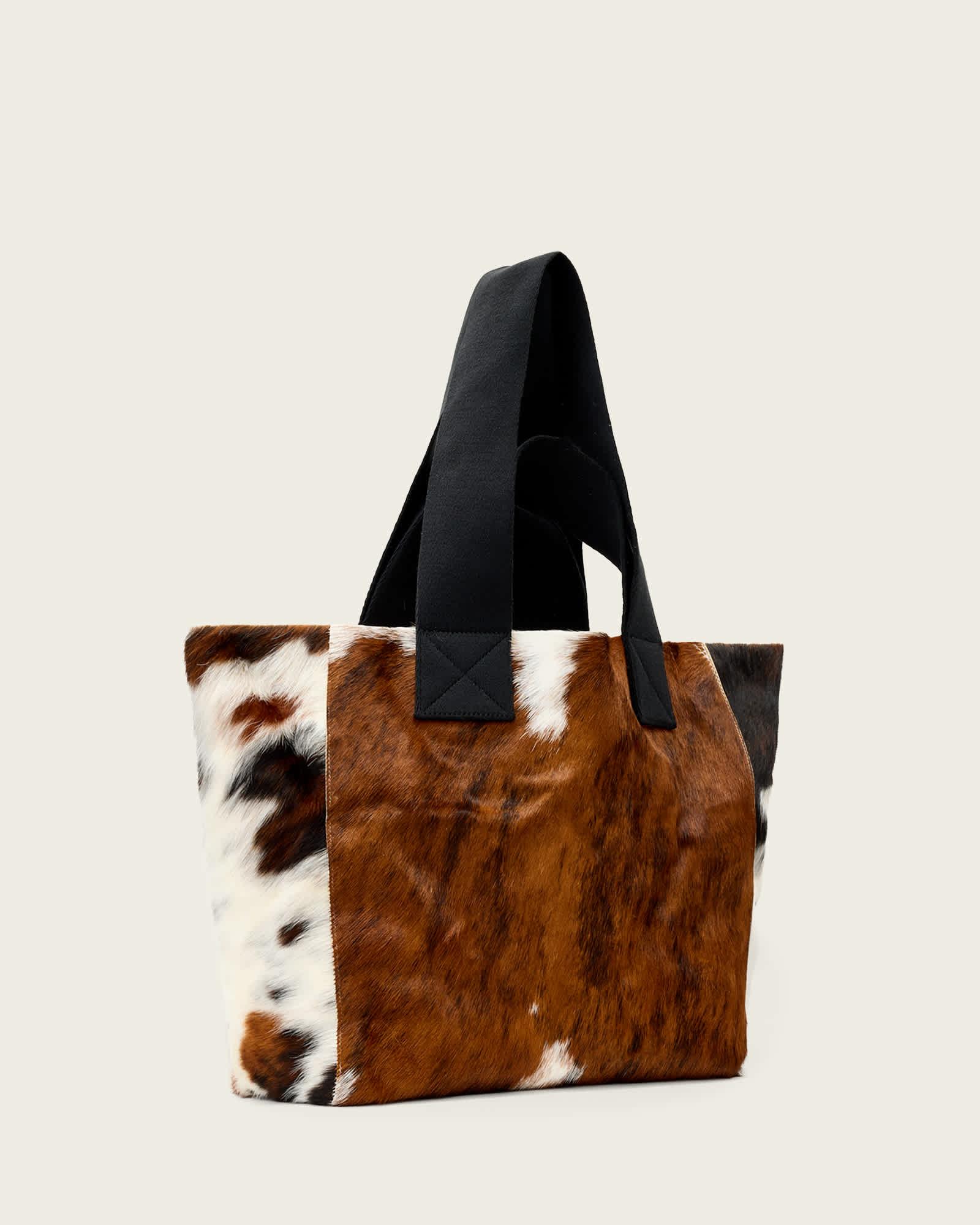 Izzy Cow Leather Tote Bag COW PRINT | ALLSAINTS US Product Image