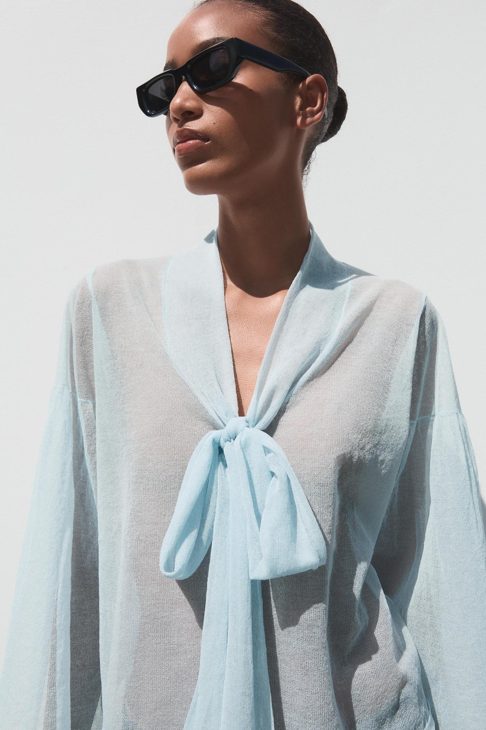 SEMI-SHEER KNIT BLOUSE Product Image