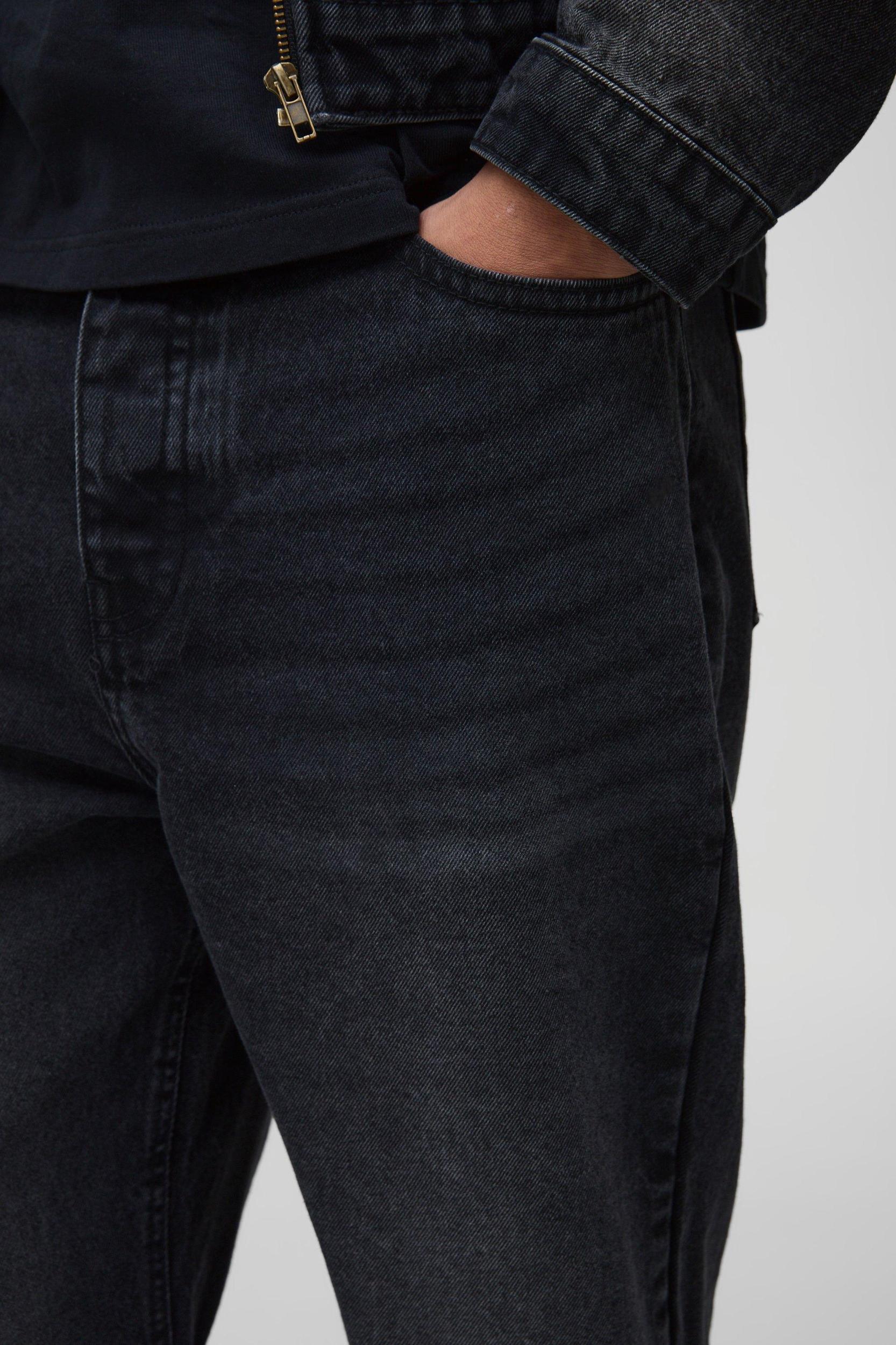 Relaxed Flare Washed Black Ripped Knee Jeans | boohooMAN USA Product Image