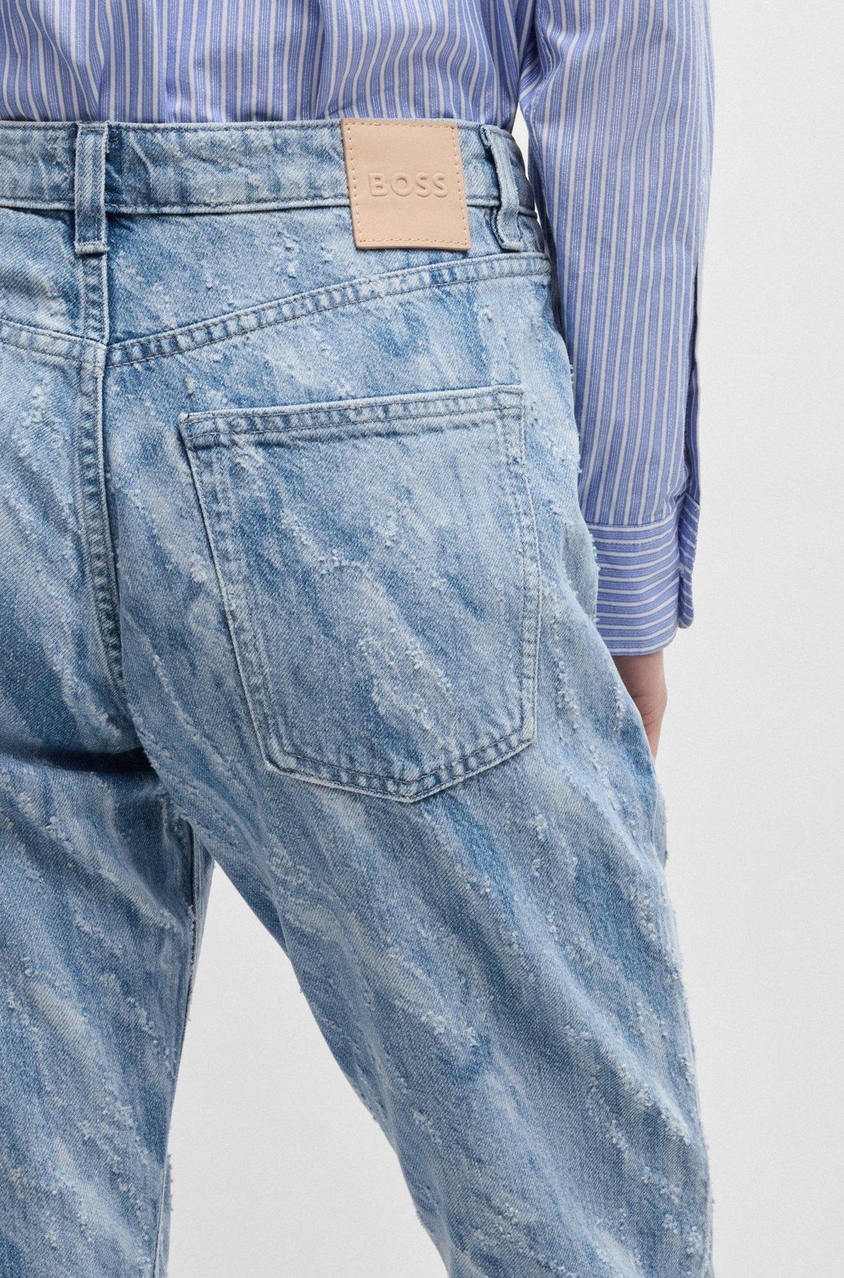 Slim-fit jeans in laser-patterned blue denim Product Image