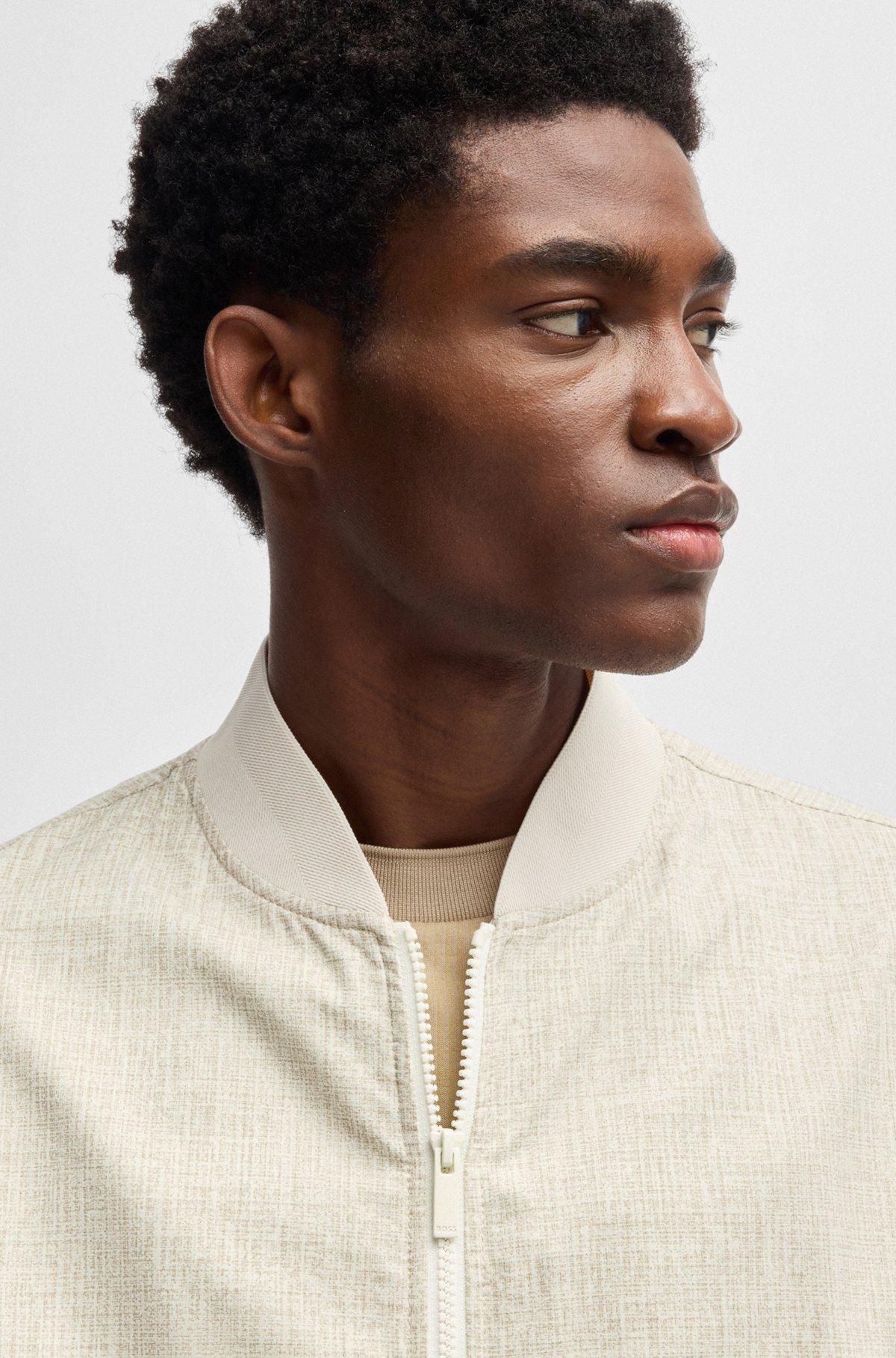 Water-repellent packable jacket with two-way zip Product Image