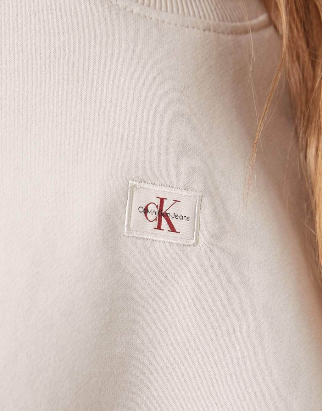 Calvin Klein Jeans woven label sweatshirt in off-white Product Image