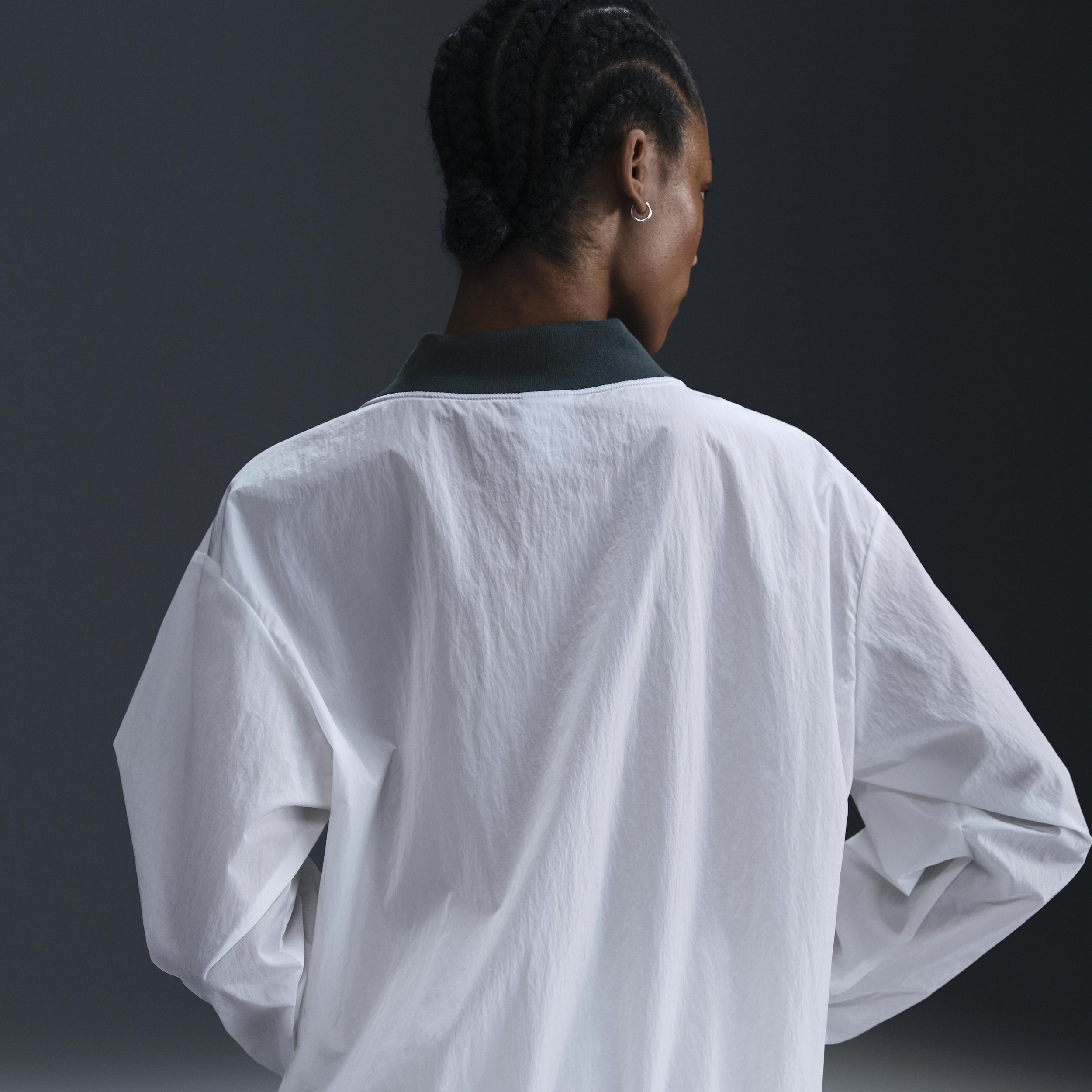 Women's Nike Sportswear Essential Loose UV Woven Long-Sleeve V-Neck Top Product Image