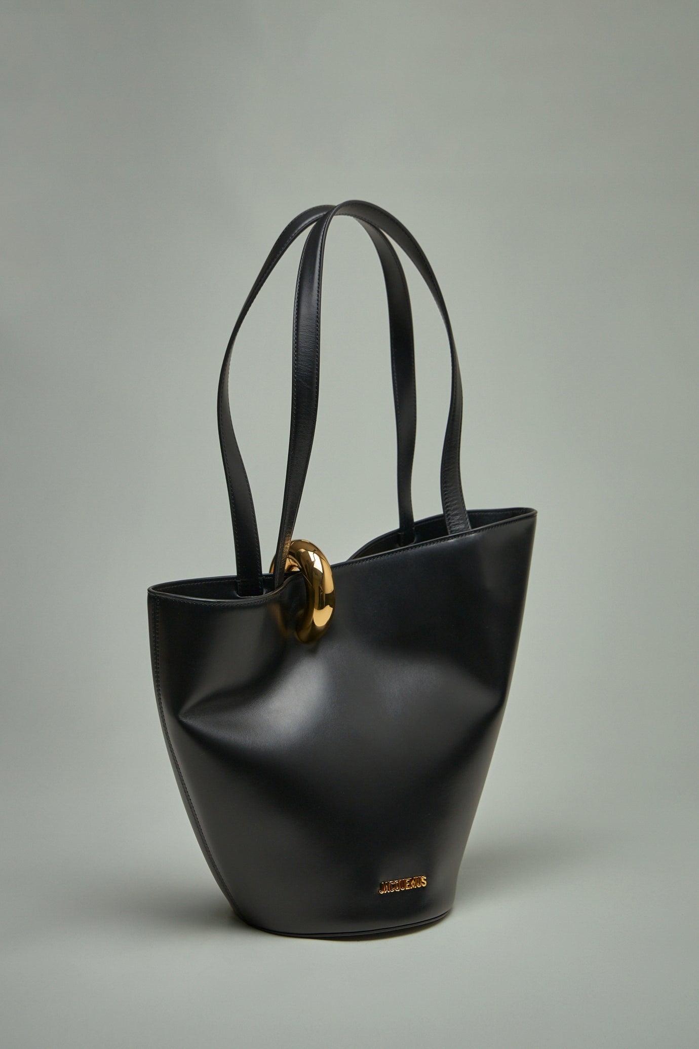 JACQUEMUS The Medium Bambola Asymmetric Leather Bucket Bag In Black 990 Product Image