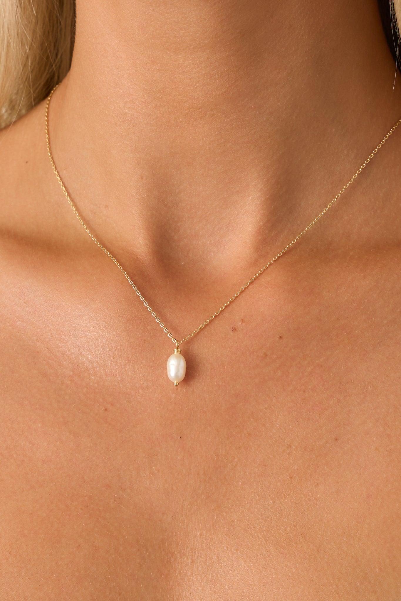 A Brighter Perspective Gold Ivory Pearl Necklace Product Image