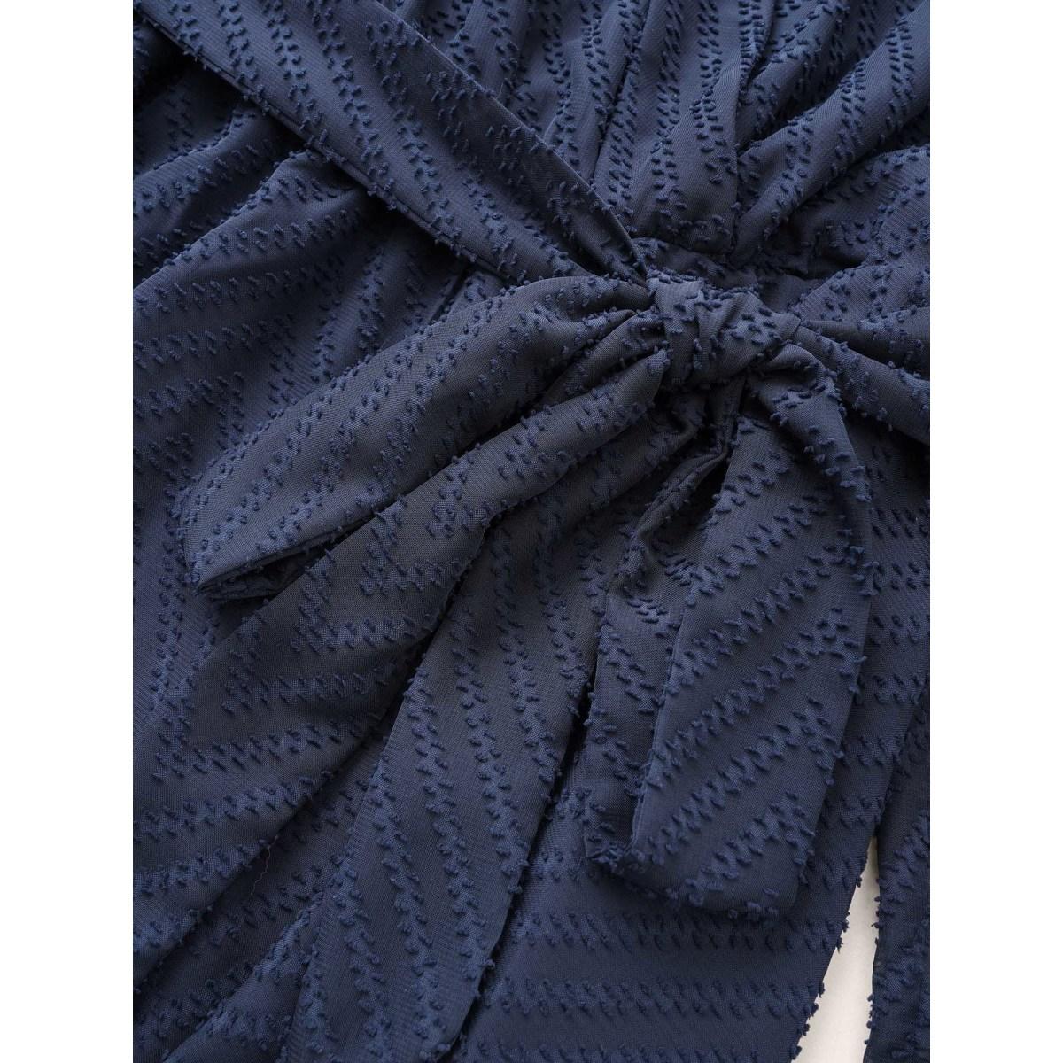 Plus Size Indigo Plain Textured High Low Hem Ties Blouse Women Office Long Sleeve Overlap Collar Office Blouses BloomChic 12/L Product Image