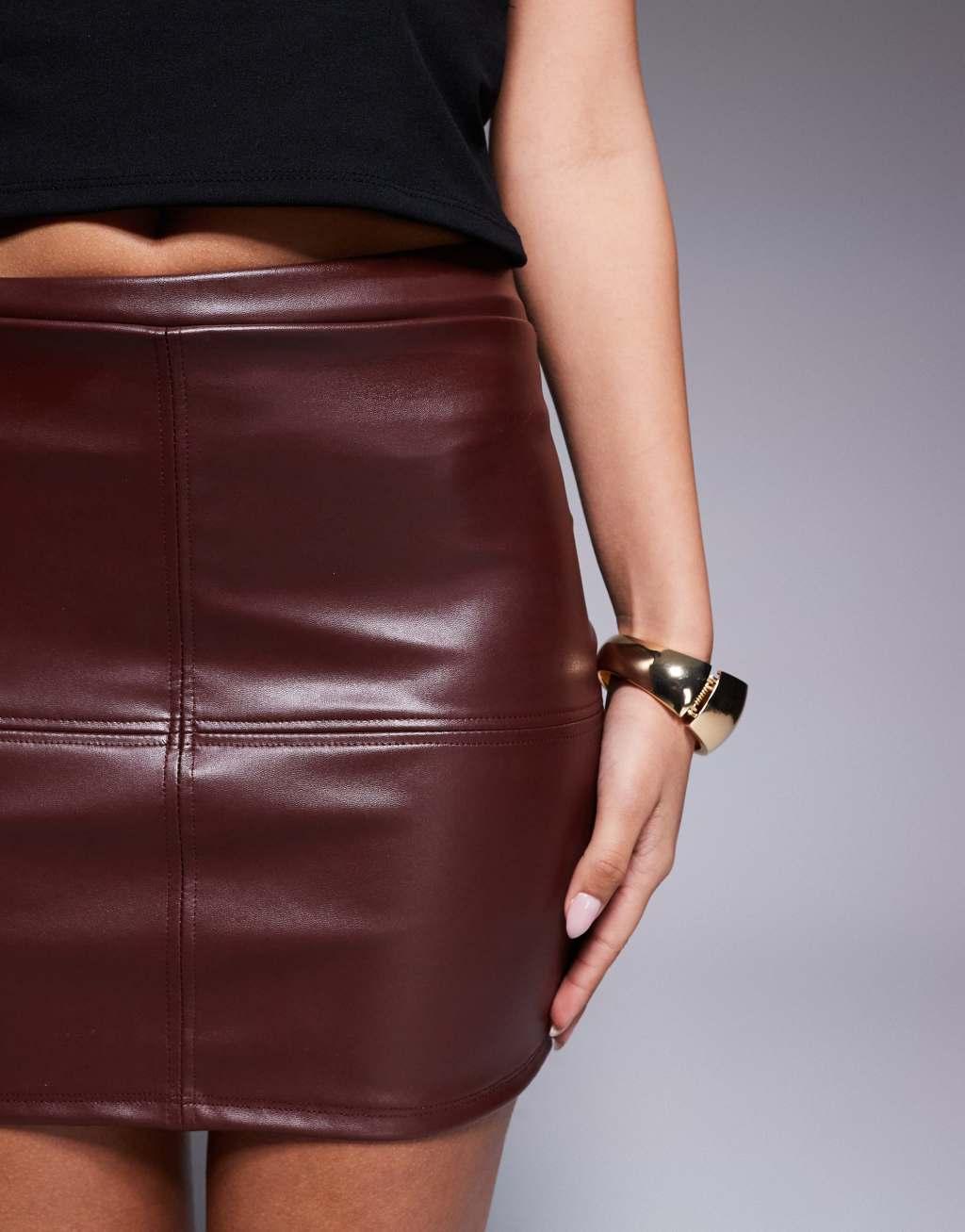 ASOS DESIGN leather look mini skirt with seam detail in brown Product Image