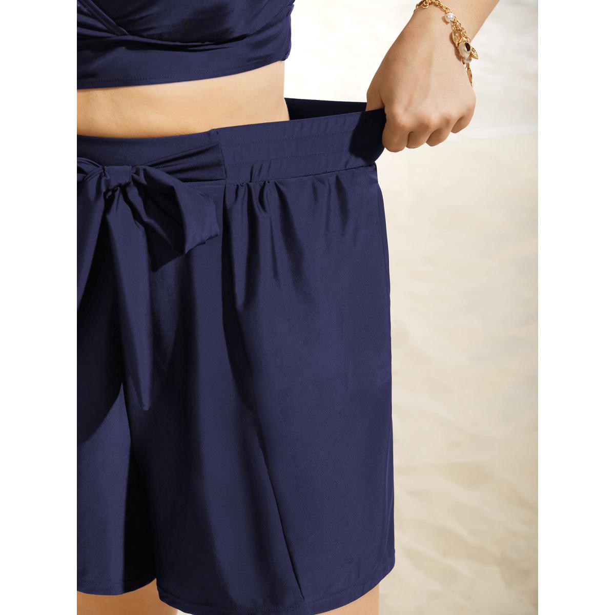 Plus Size High Rise Tie Knot Wideband Waist Swim Bottom Women's Swimwear Indigo Beach Tie knot High stretch Bodycon High Rise Side seam pocket Curve Swim Bottoms BloomChic 30/6X Product Image