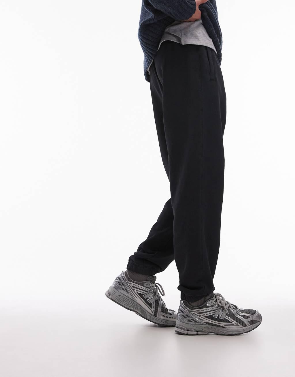 Topman washed oversized sweatpants in black Product Image