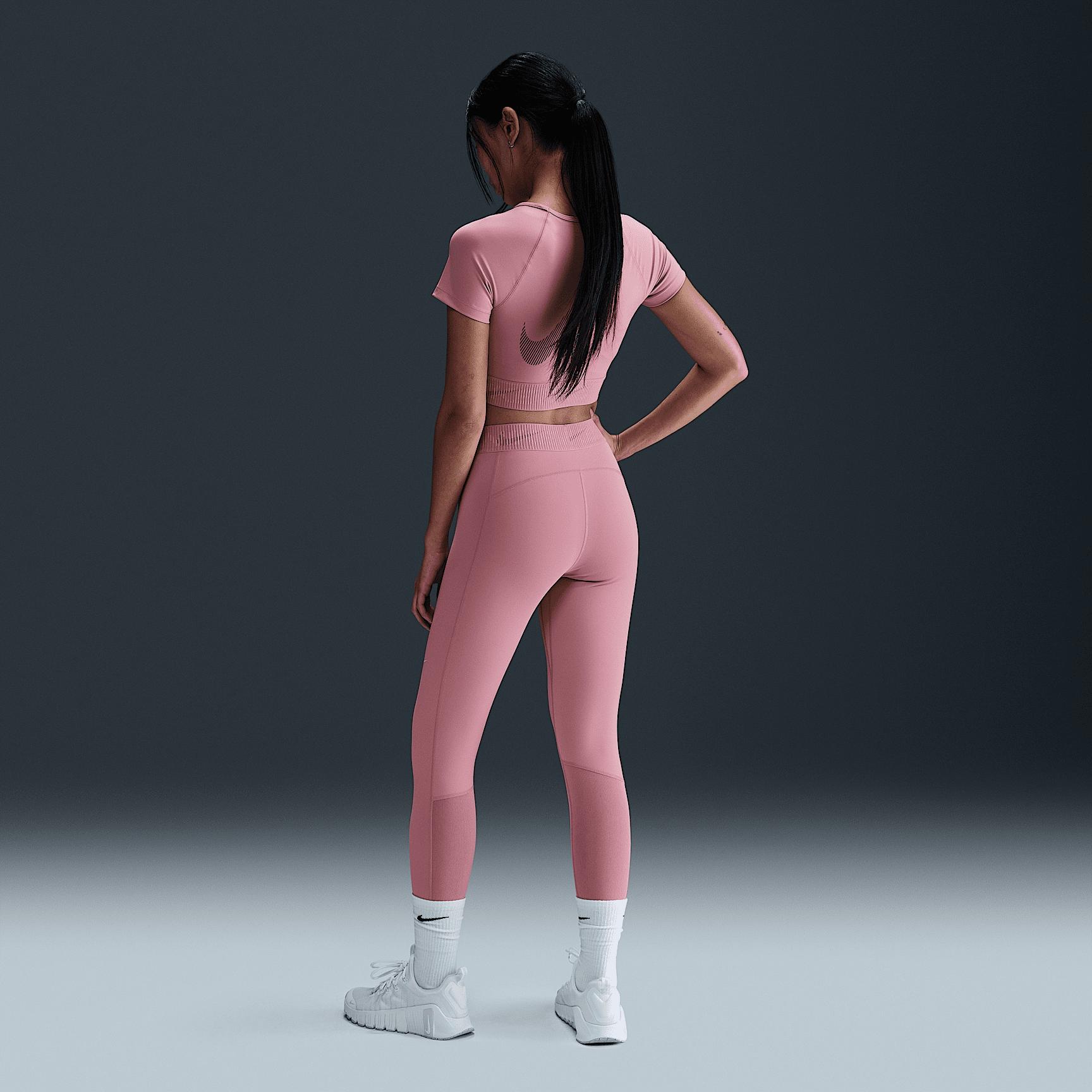 Womens Nike Pro Dri-FIT Mid-Rise 7/8 Graphic Leggings Product Image