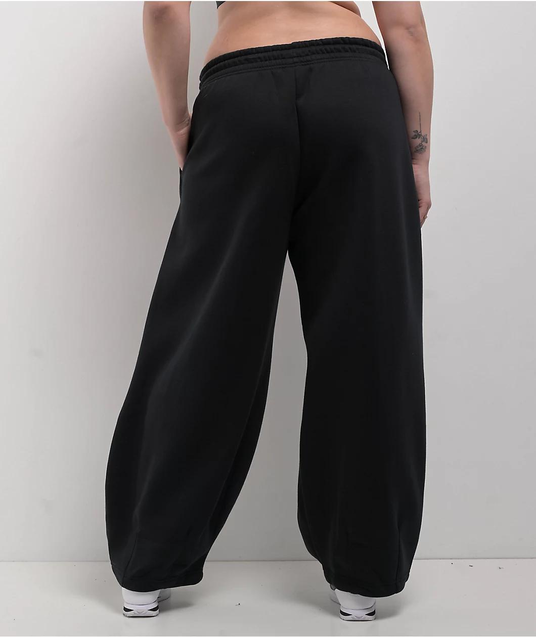 Nike Sportswear Phoenix Fleece Black Mid-Rise Oversized Tapered Sweatpants Product Image