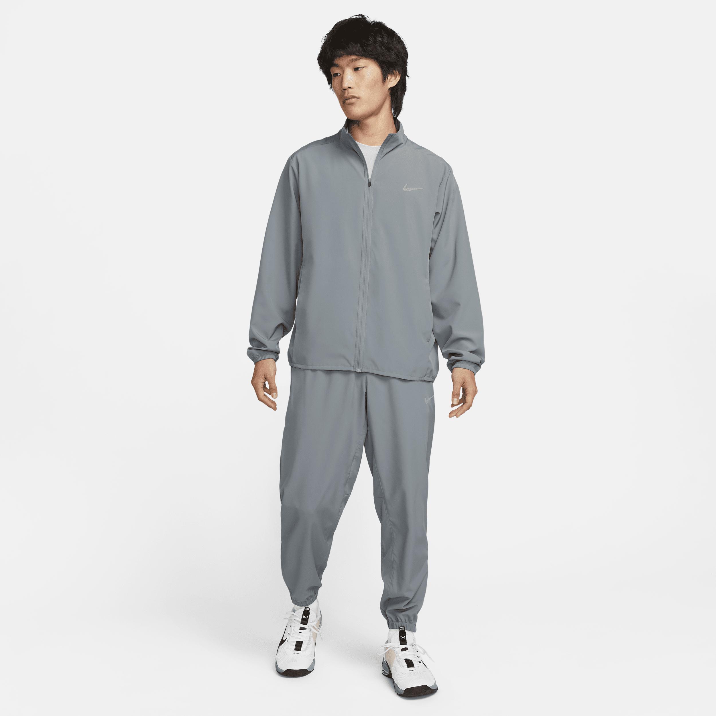 Nike Mens Form Dri-FIT Tapered Versatile Pants | FB7497-084 Product Image