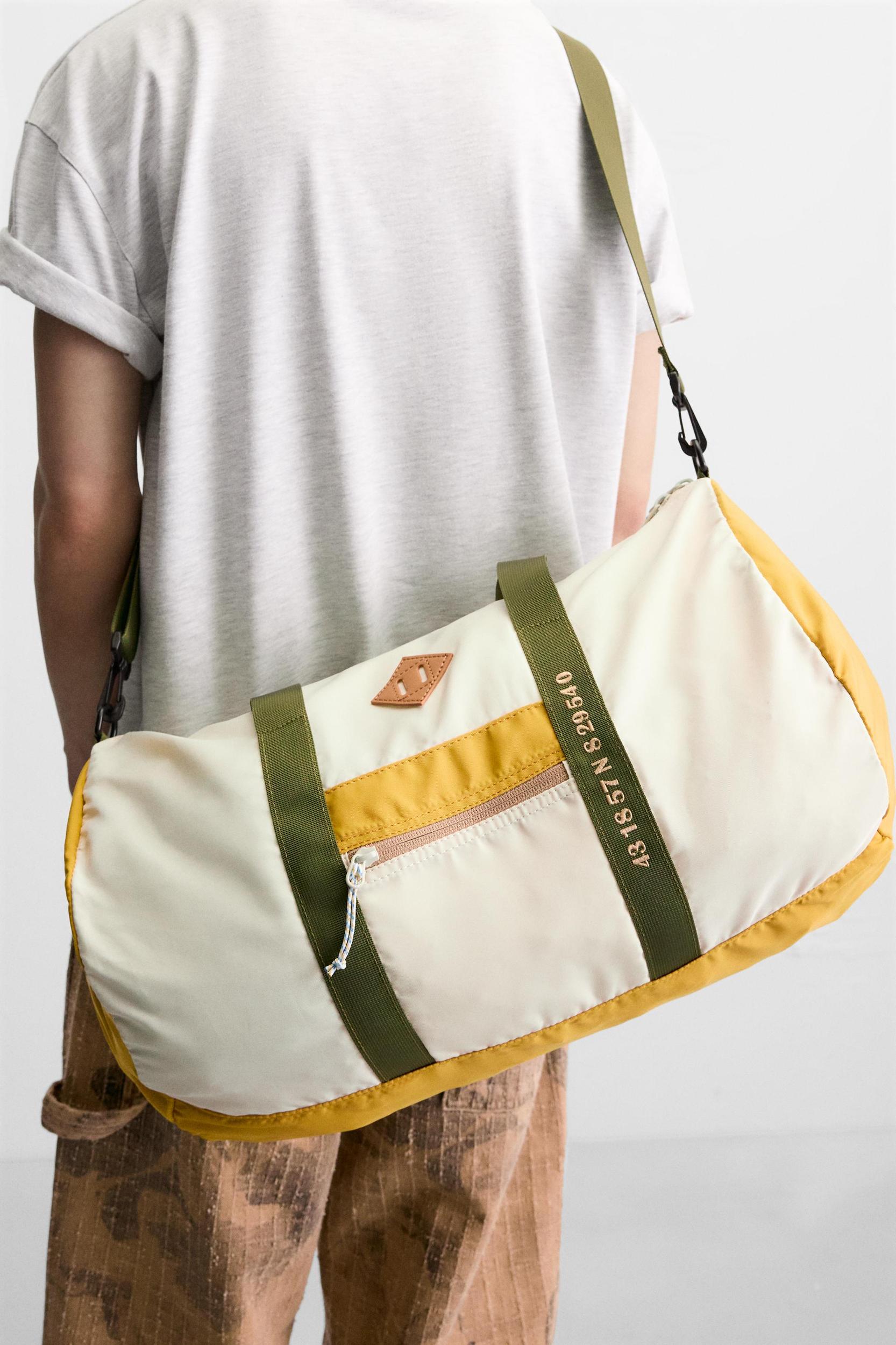 CONTRAST TRAVEL BAG Product Image