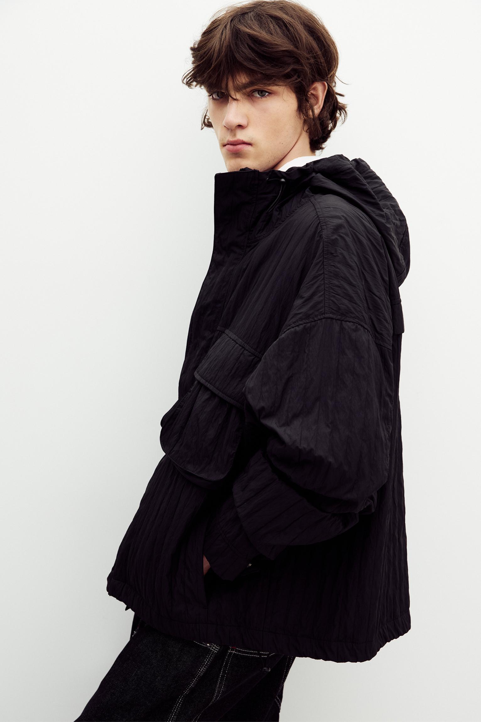 Creased raincoat with hood Product Image