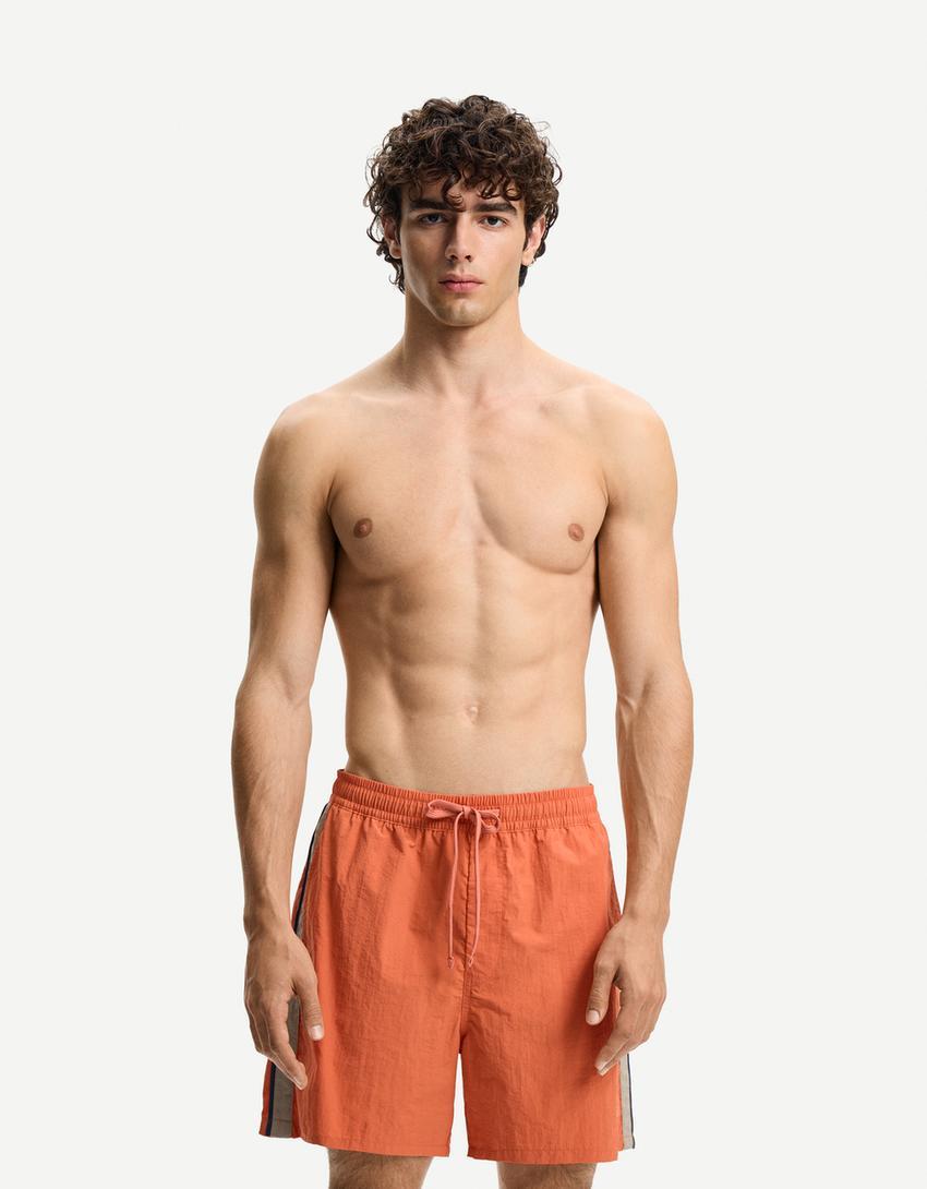 Boxy-fit board shorts with stripes Product Image
