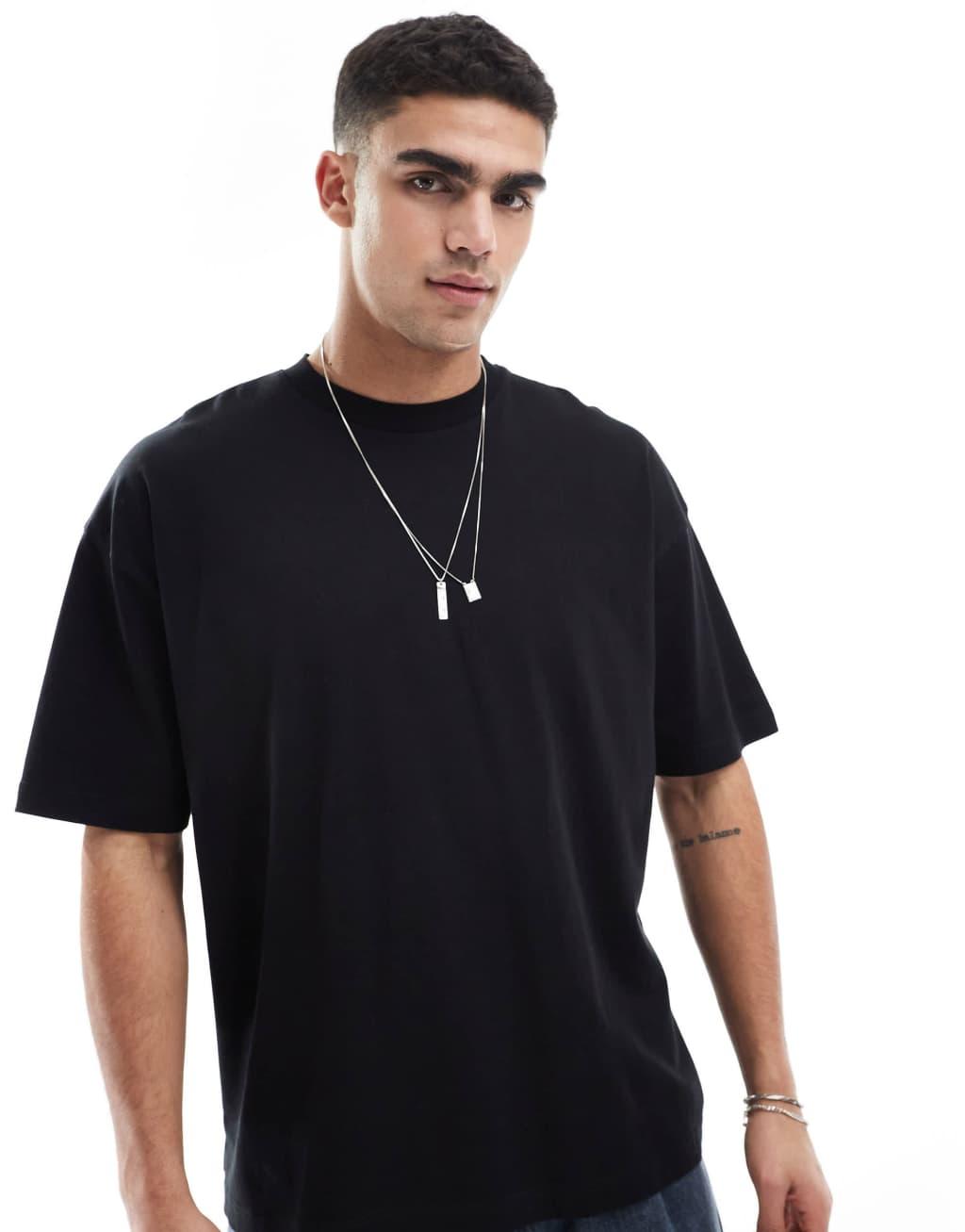 ASOS DESIGN oversized t-shirt with floral graphic in black Product Image