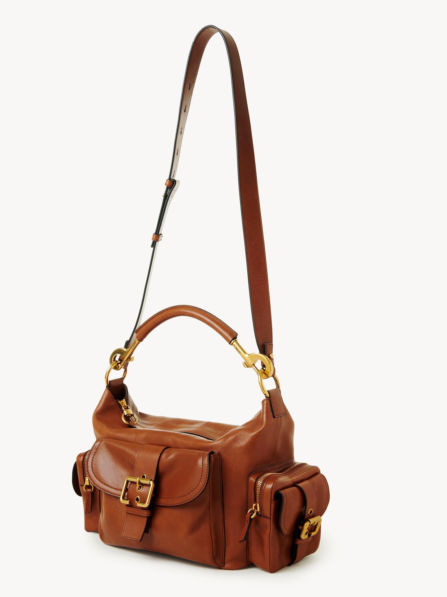 Camera bag in shiny leather Product Image