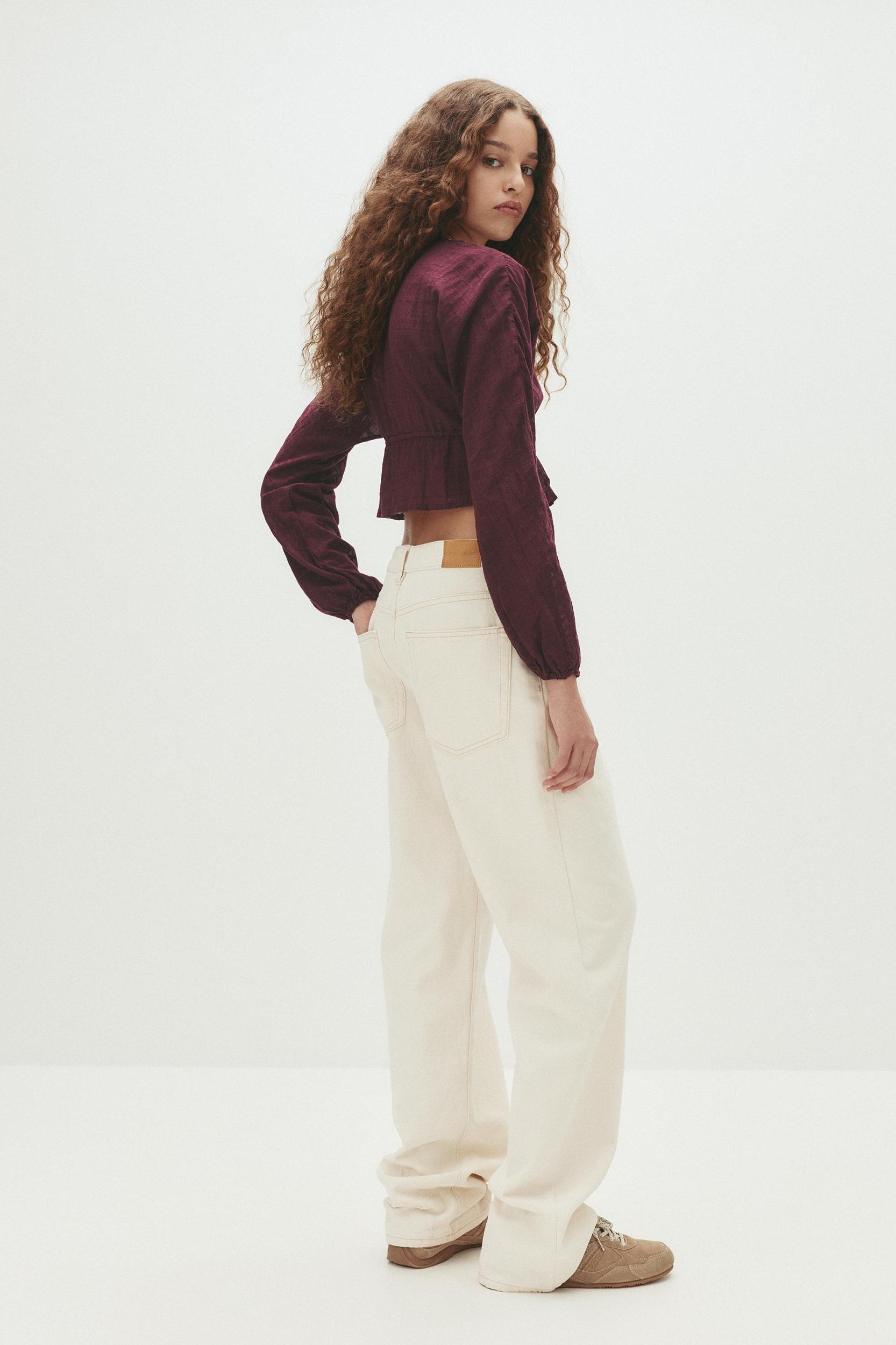 Beaded blouse with bow Product Image