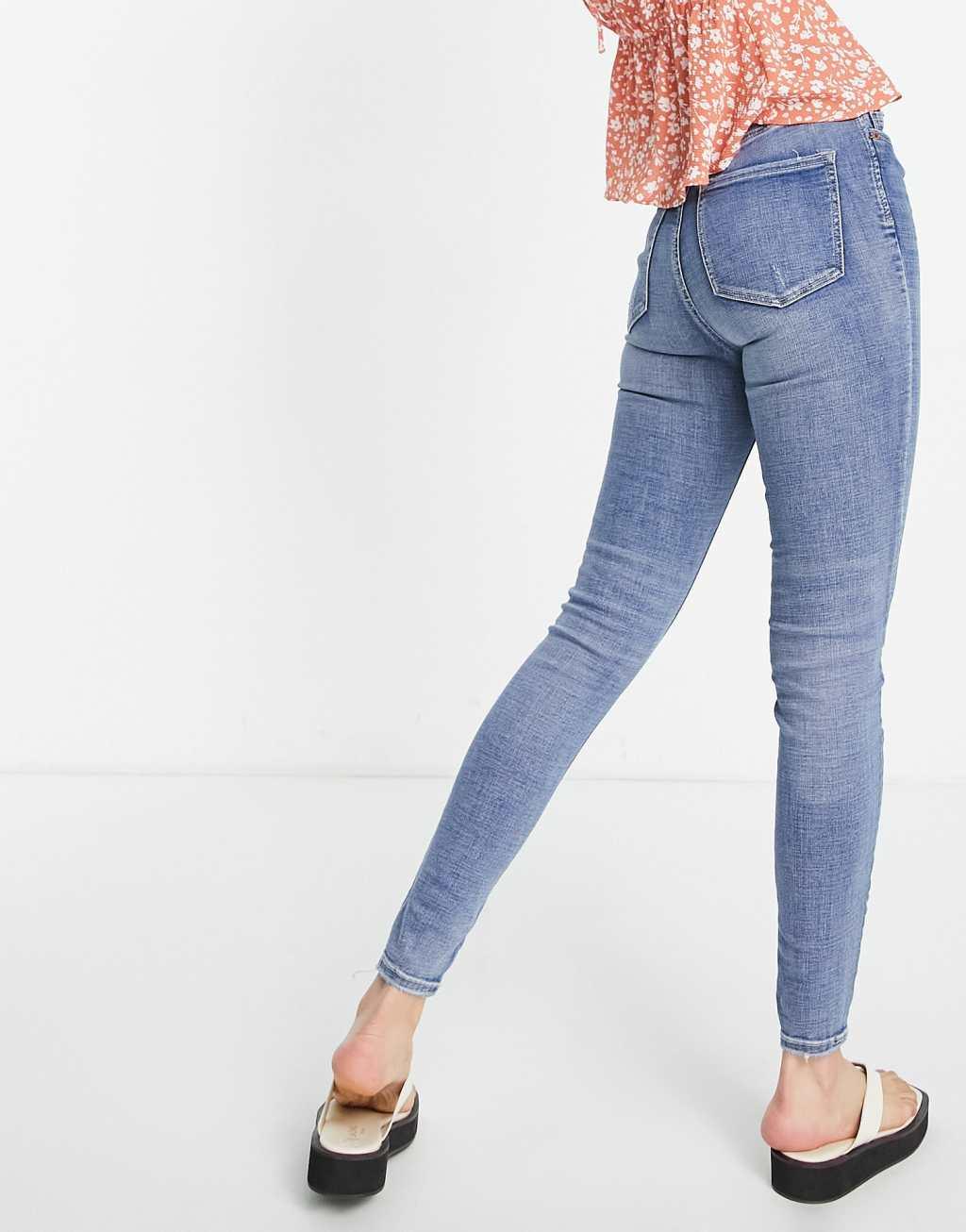 Stradivarius Tall super high waist skinny jeans in medium blue Product Image