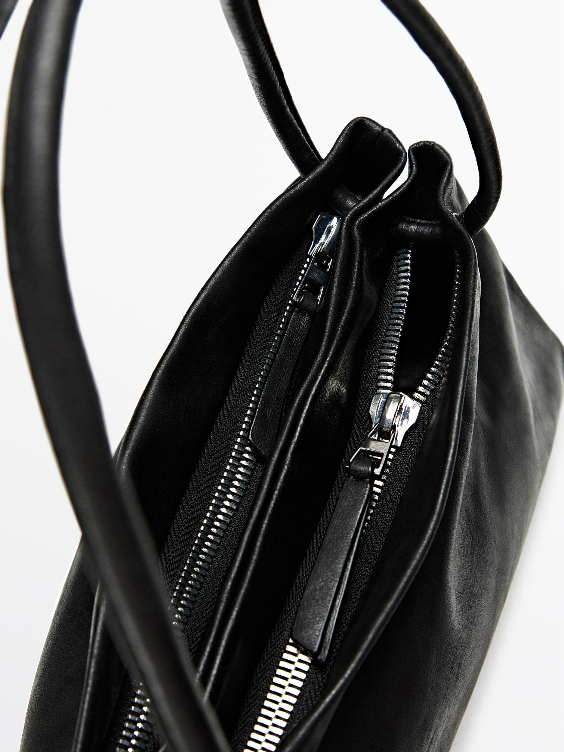 Small nappa leather bag with compartments Product Image