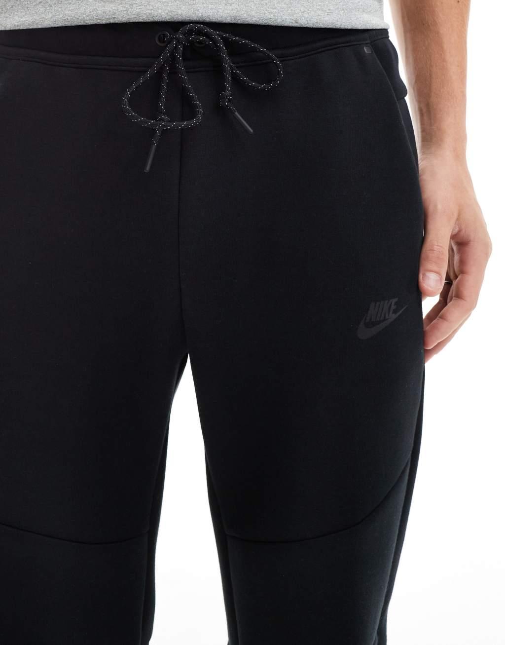 Nike Tech Fleece cuffed joggers in black Product Image
