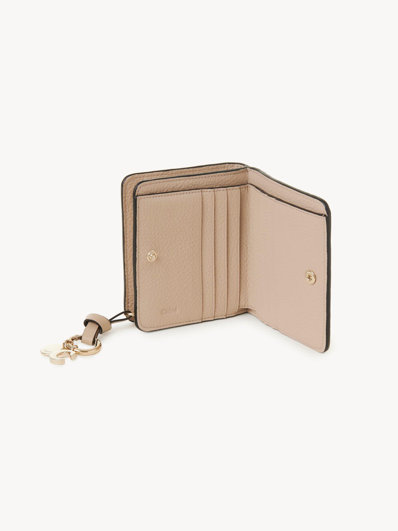 Alphabet compact wallet in grained leather Product Image