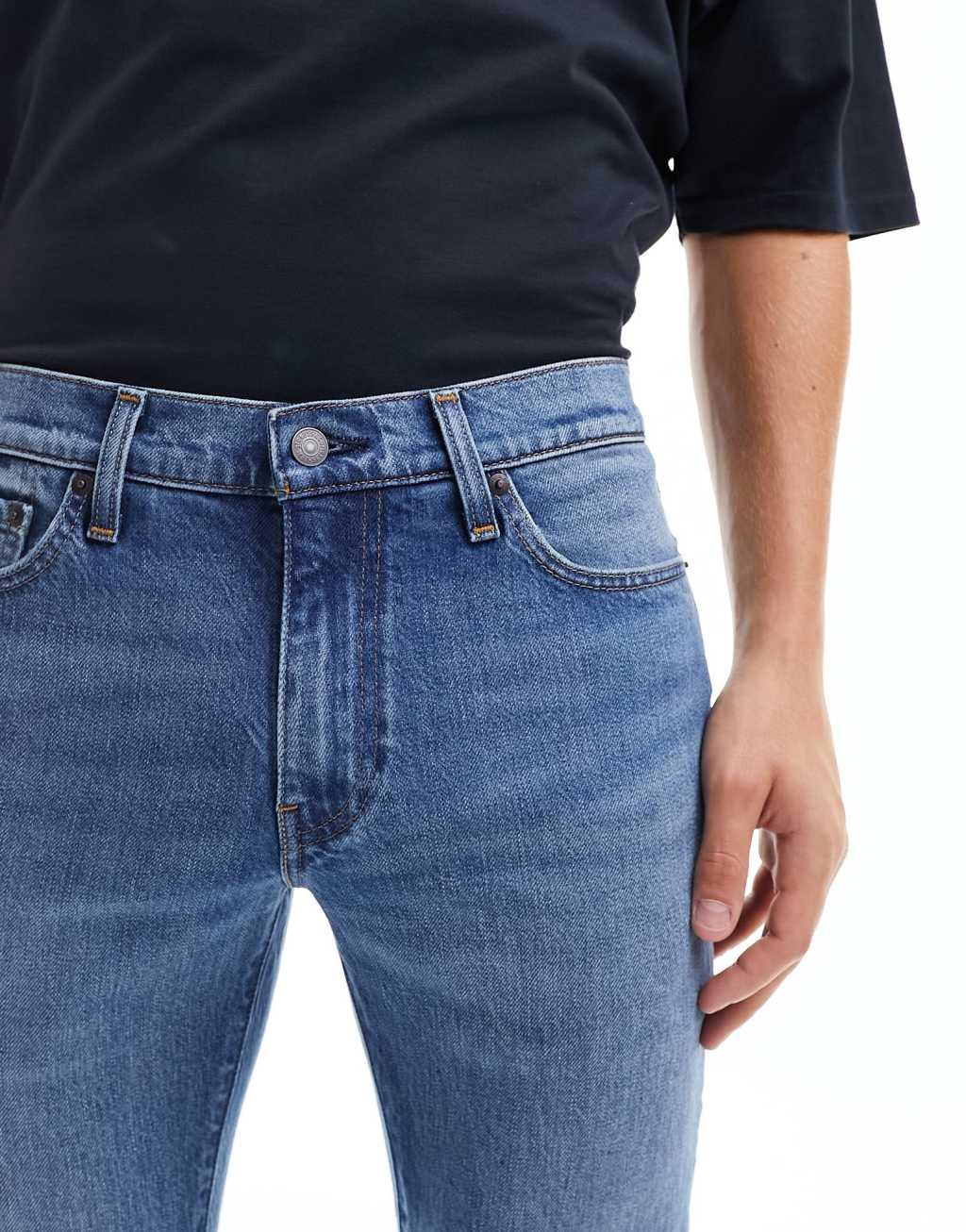 Levi's 511 slim fit jeans in mid blue Product Image