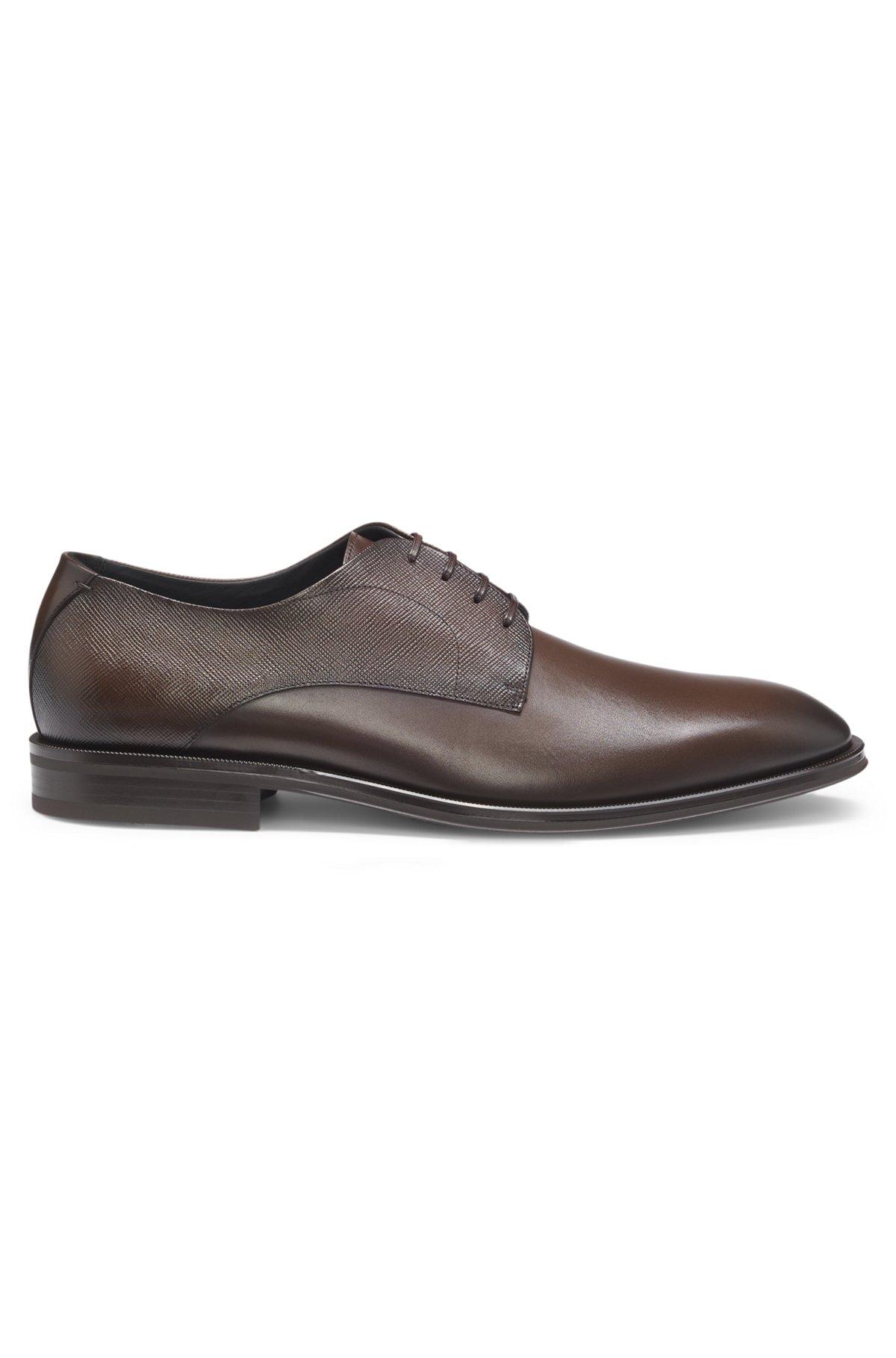 Derby shoes in textured and smooth leather Product Image
