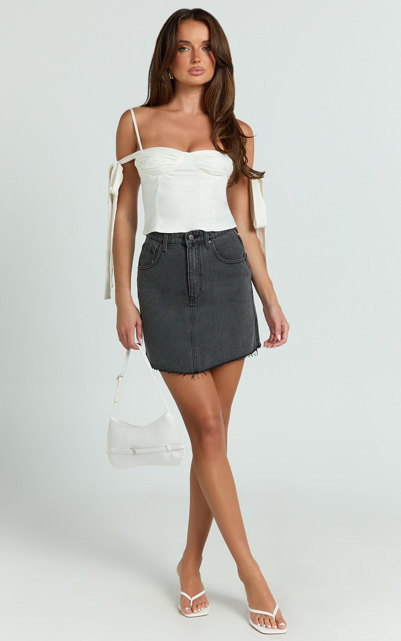 Adan Mini Skirt - Recycled Cotton Frayed Hem Denim Skirt in Black Product Image