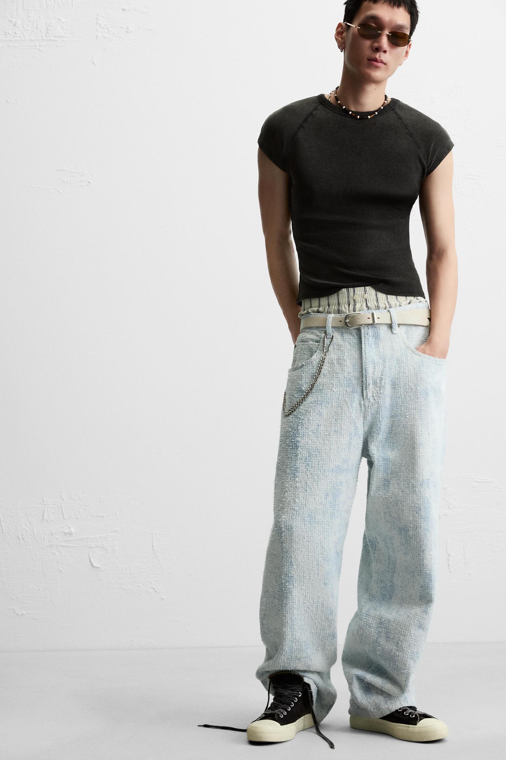 DISTRESSED FINISH BAGGY FIT JEANS Product Image