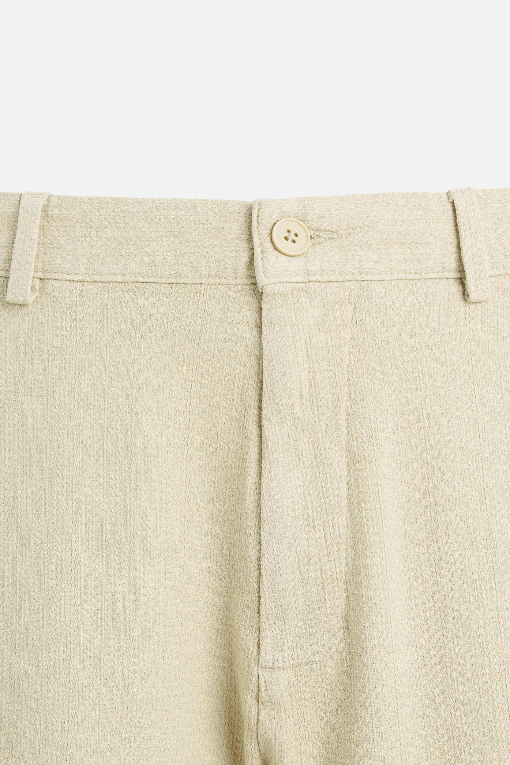 TEXTURED CHINO PANTS Product Image