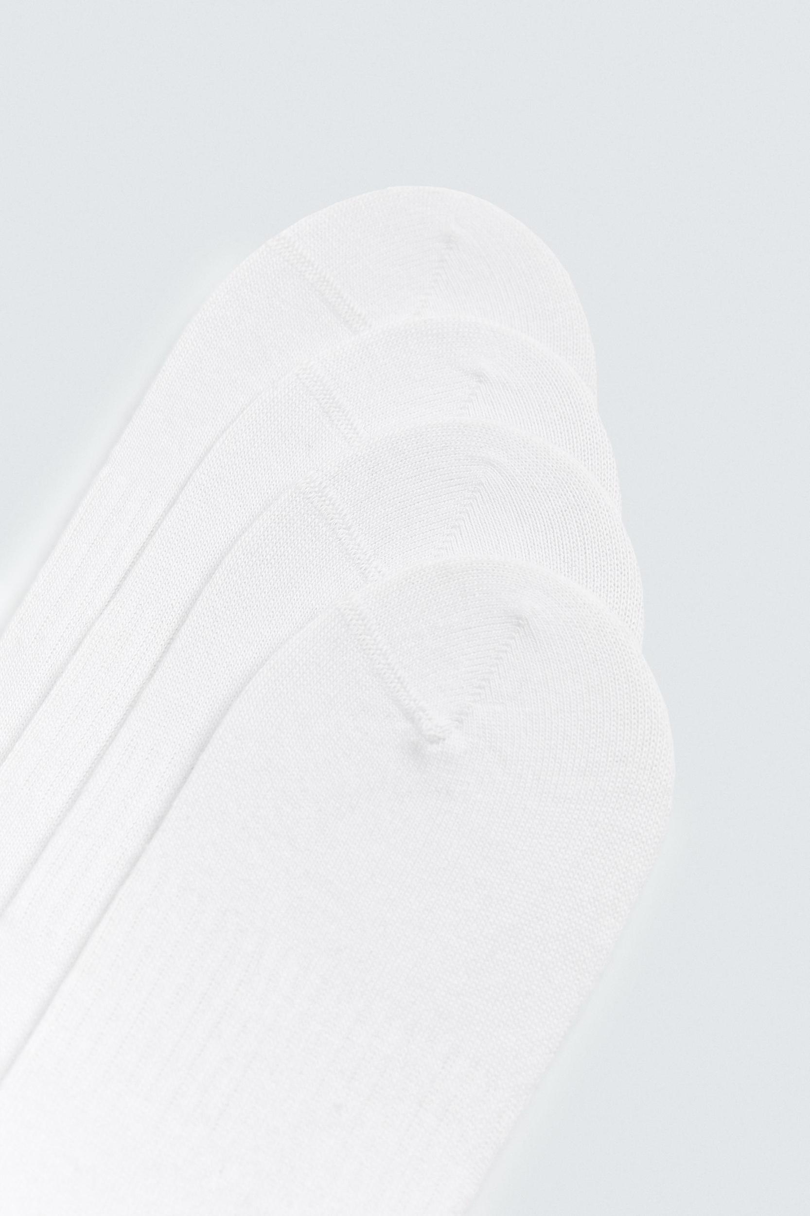 4 PACK OF NO-SHOW SOCKS Product Image