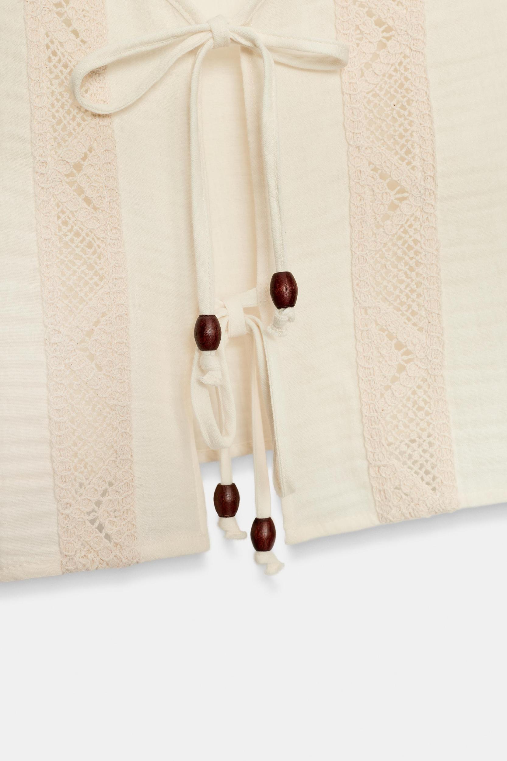 EMBROIDERED TIE TOP Product Image
