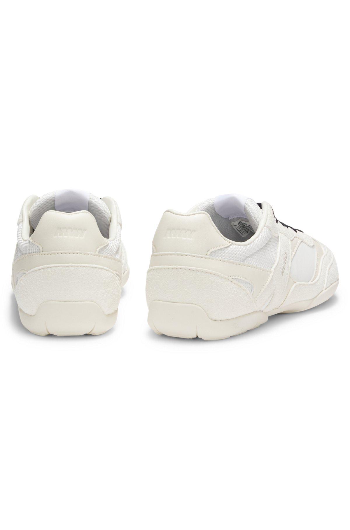 Mixed-material trainers with open mesh Product Image