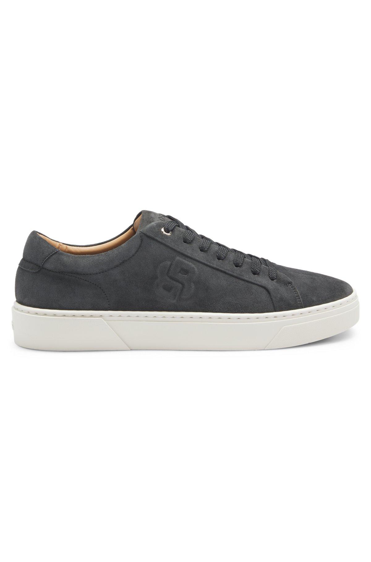 Low-top trainers in grained faux leather Product Image