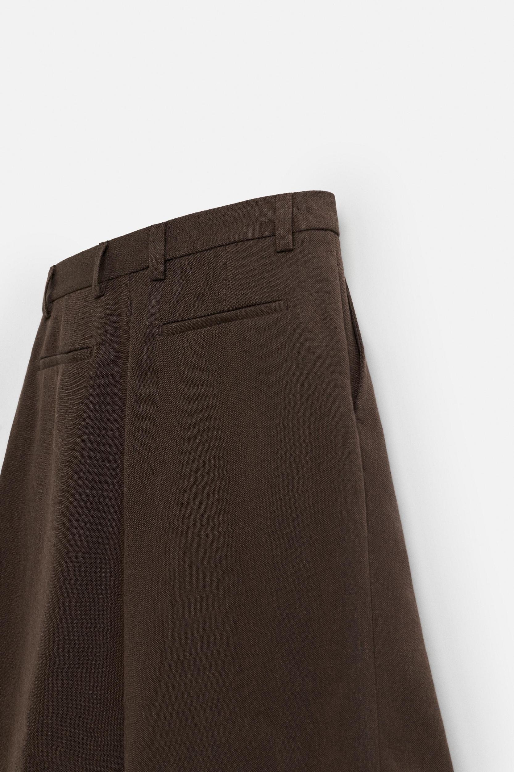 TEXTURED PLEATED SHORTS Product Image