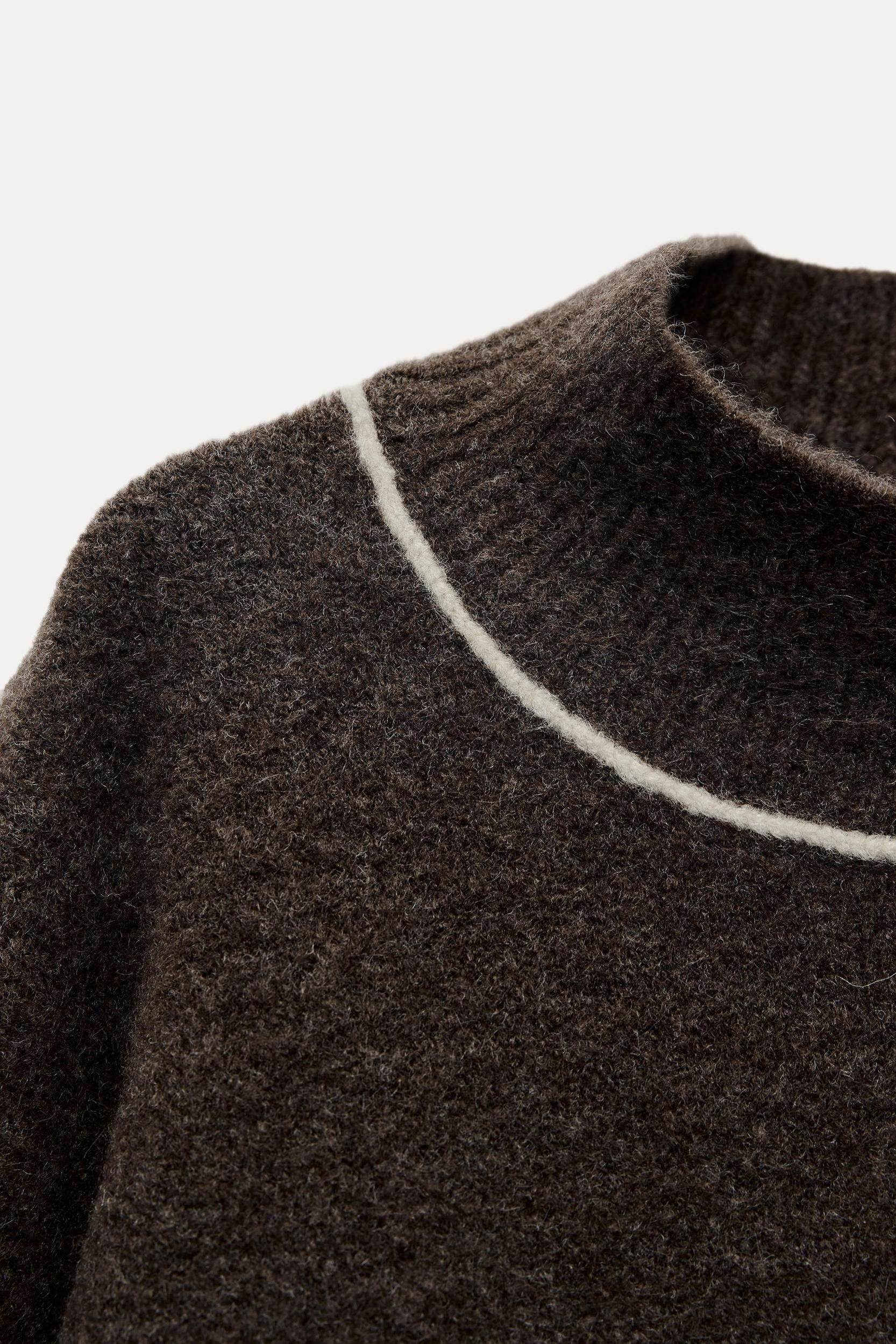 KNIT SWEATER WITH CONTRASTING PIPING Product Image