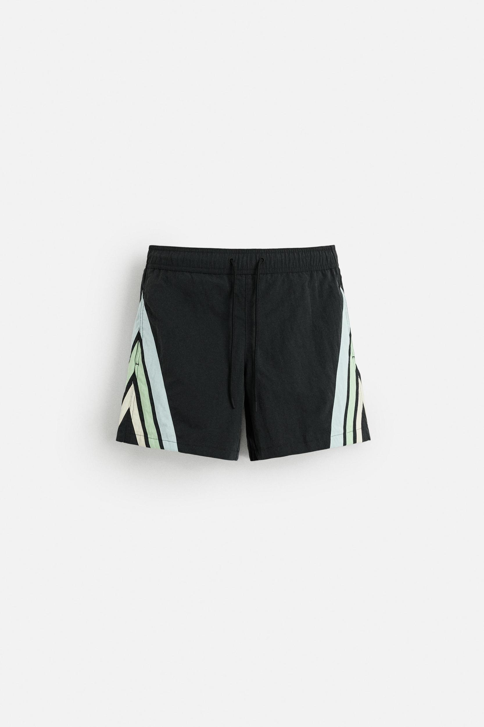 CONTRAST BANDS MID-LENGTH SWIMSUIT Product Image