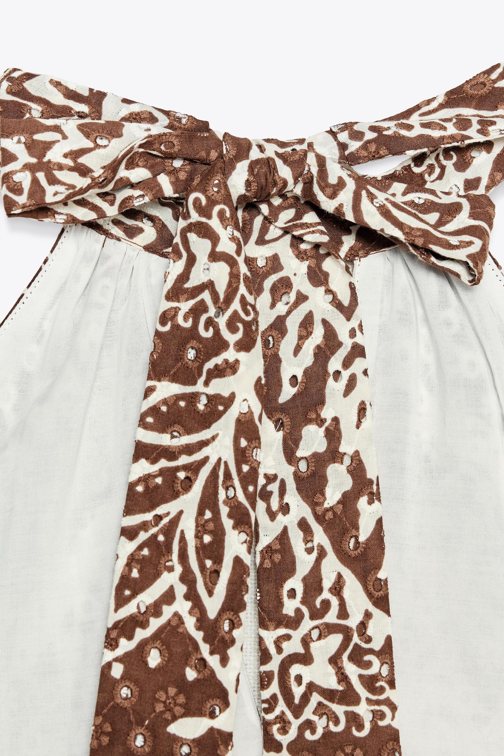 EMBROIDERED EYELET TOP Product Image