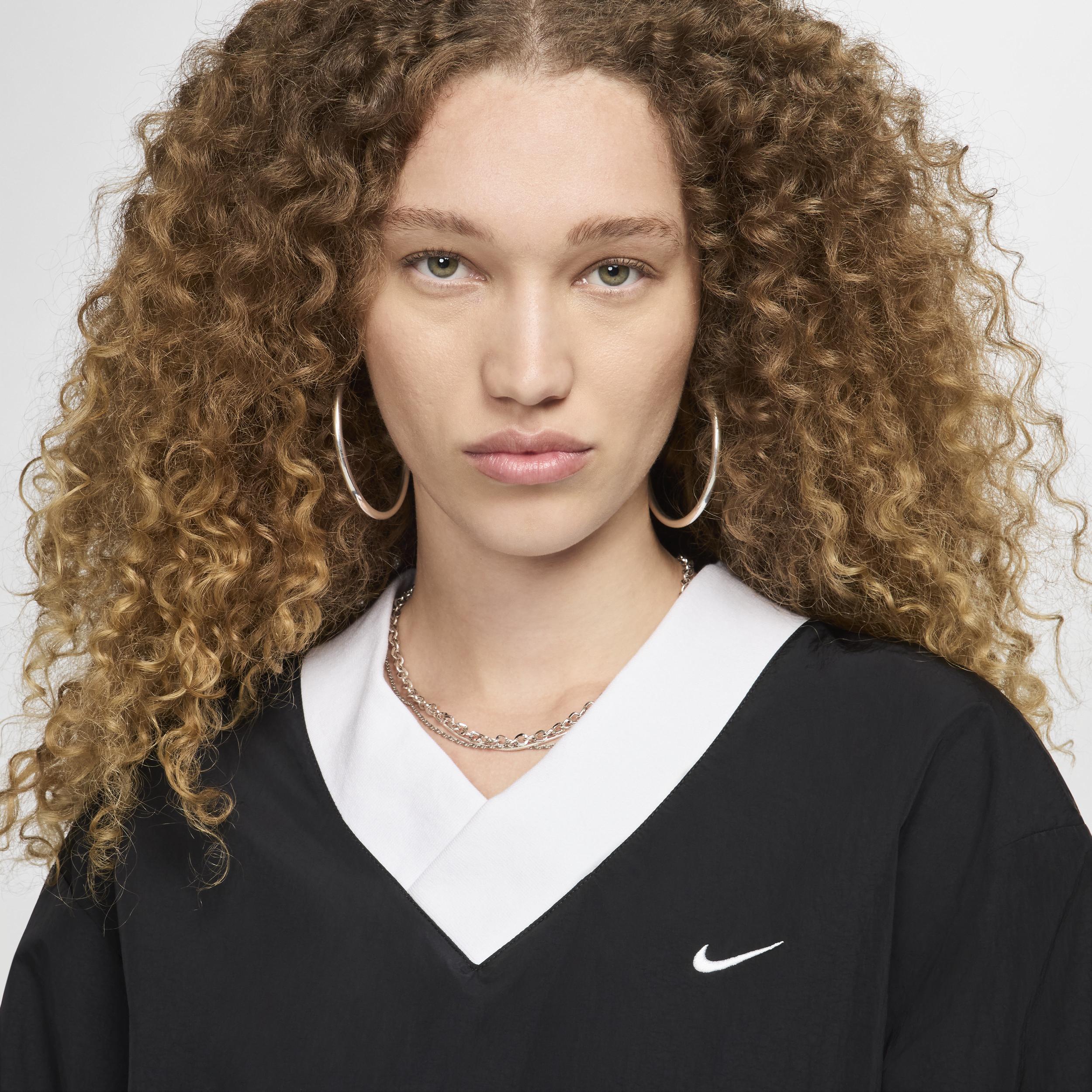 Womens Nike Sportswear Essential Loose UV Woven Long-Sleeve V-Neck Top | FV7649-010 Product Image