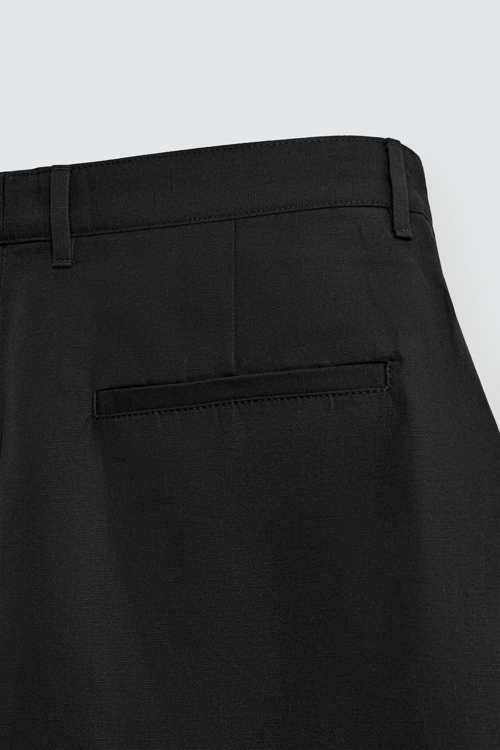 RELAXED FIT PLEATED PANTS Product Image