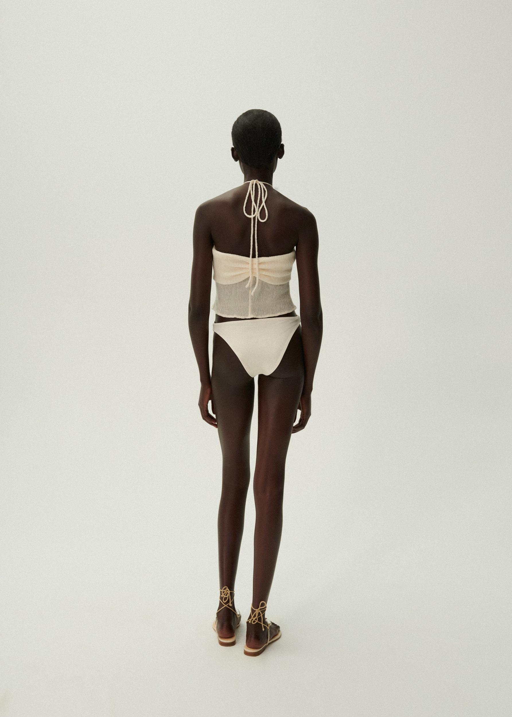 Pearl halterneck tube top in cream Product Image