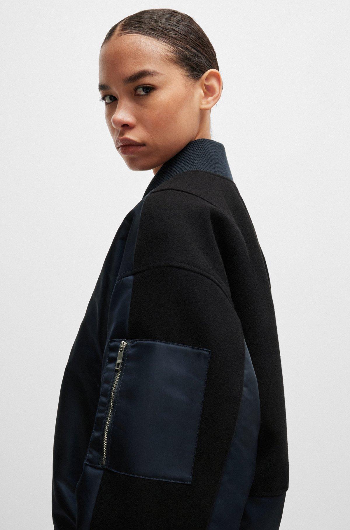 Water-repellent bomber jacket with zipped sleeve pocket Product Image