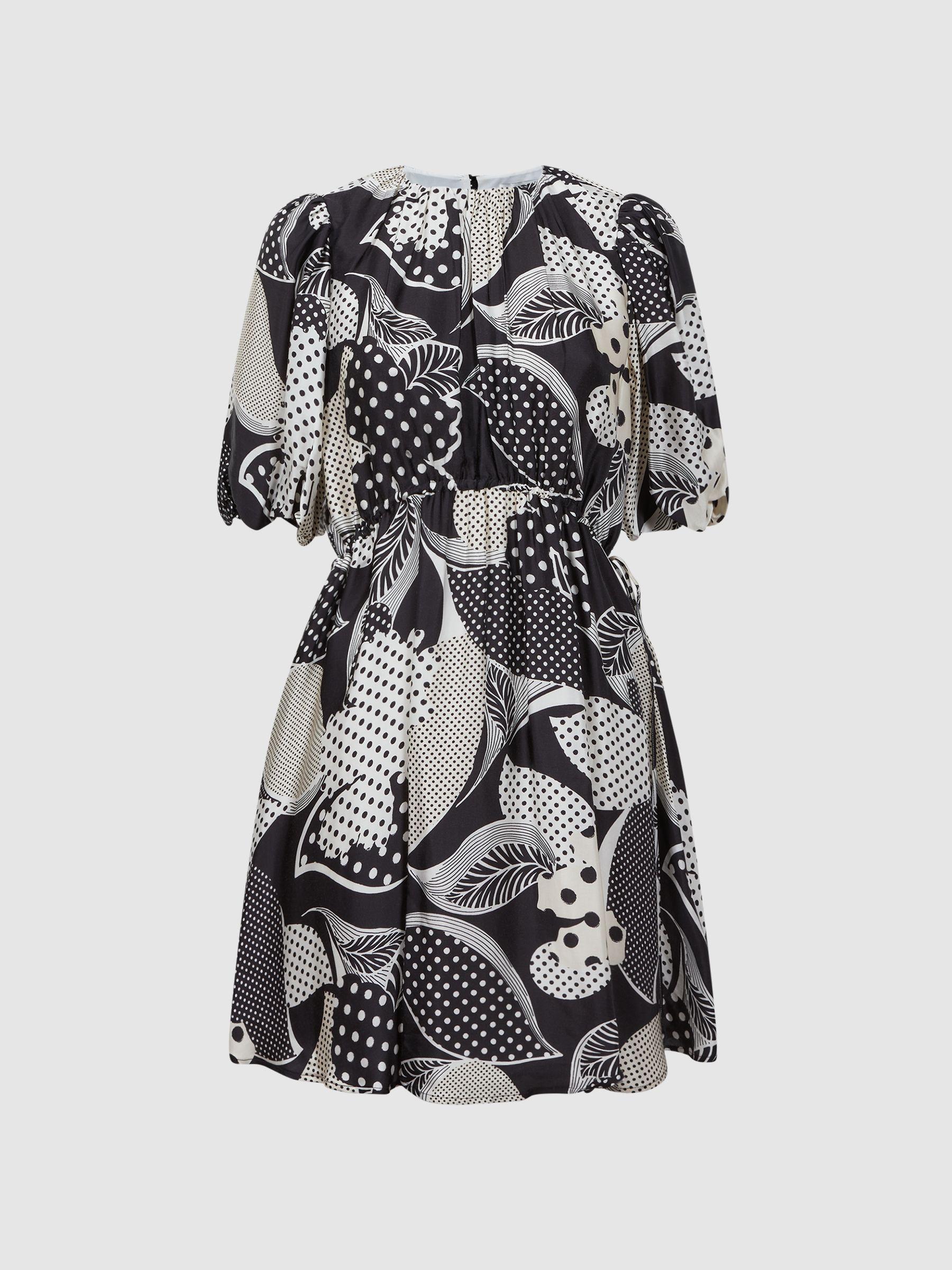 Florere Polka Dot Puff Sleeve Mini Dress in Black Product Image