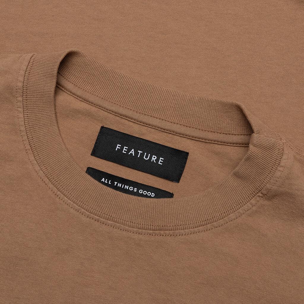 Feature x Wynn Logo Lock Up Tee - Black Male Product Image